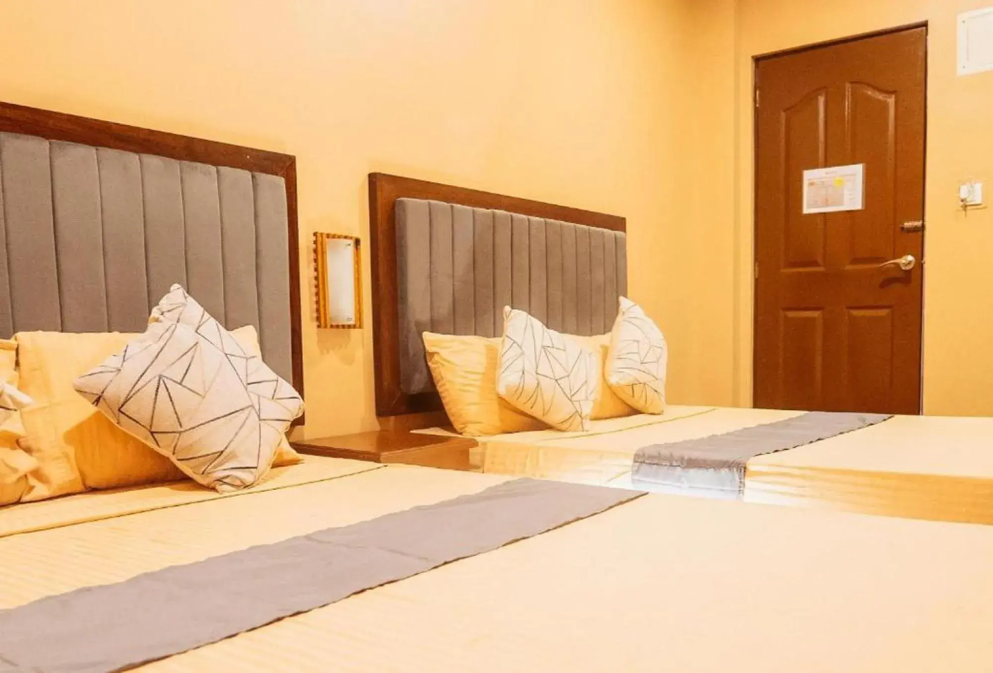 Bed in RedDoorz Plus @ Hotel Platinum Occidental Mindoro Bed in RedDoorz Plus @ Hotel Platinum Occidental Mindoro