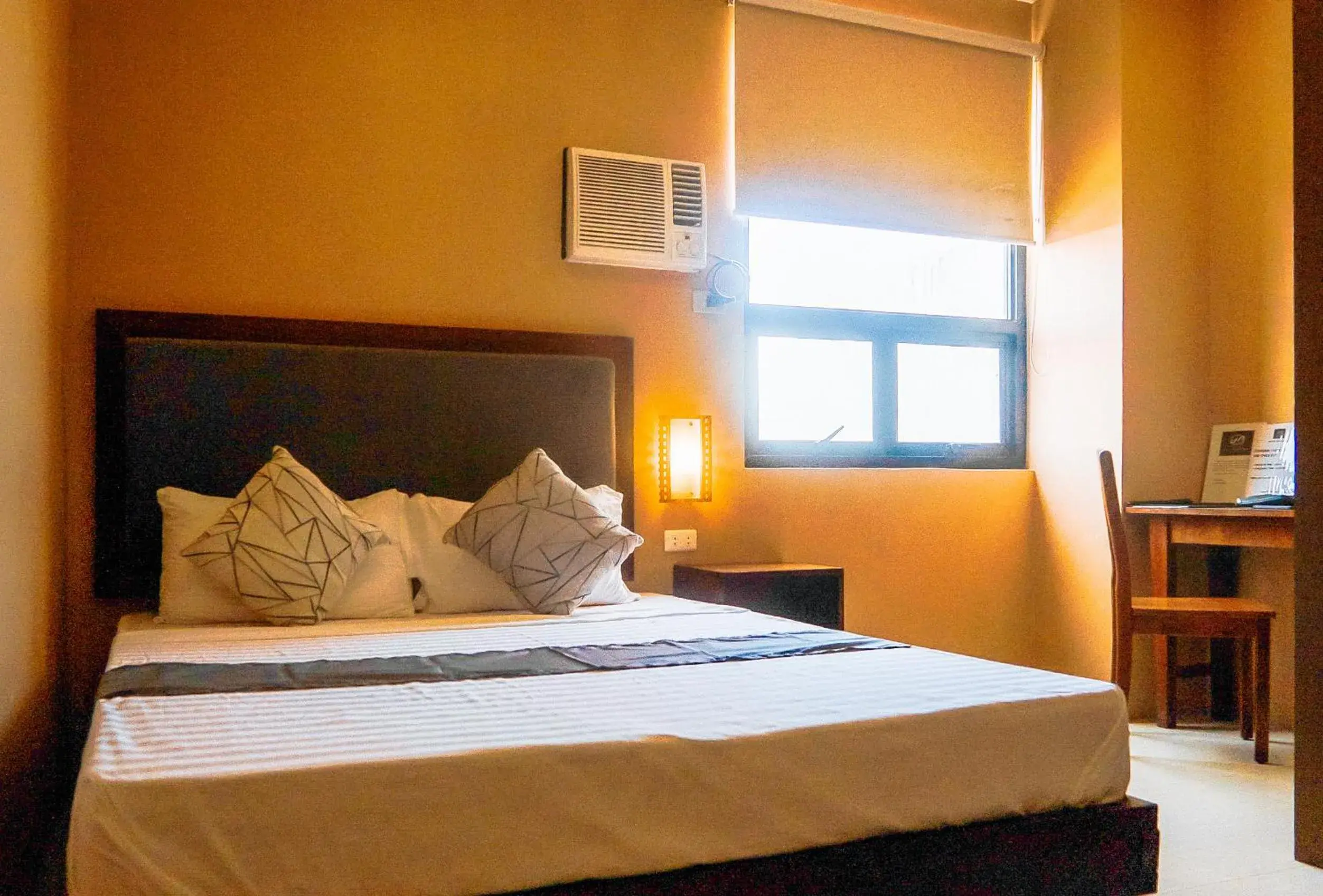 Bed in RedDoorz Plus @ Hotel Platinum Occidental Mindoro Bed in RedDoorz Plus @ Hotel Platinum Occidental Mindoro