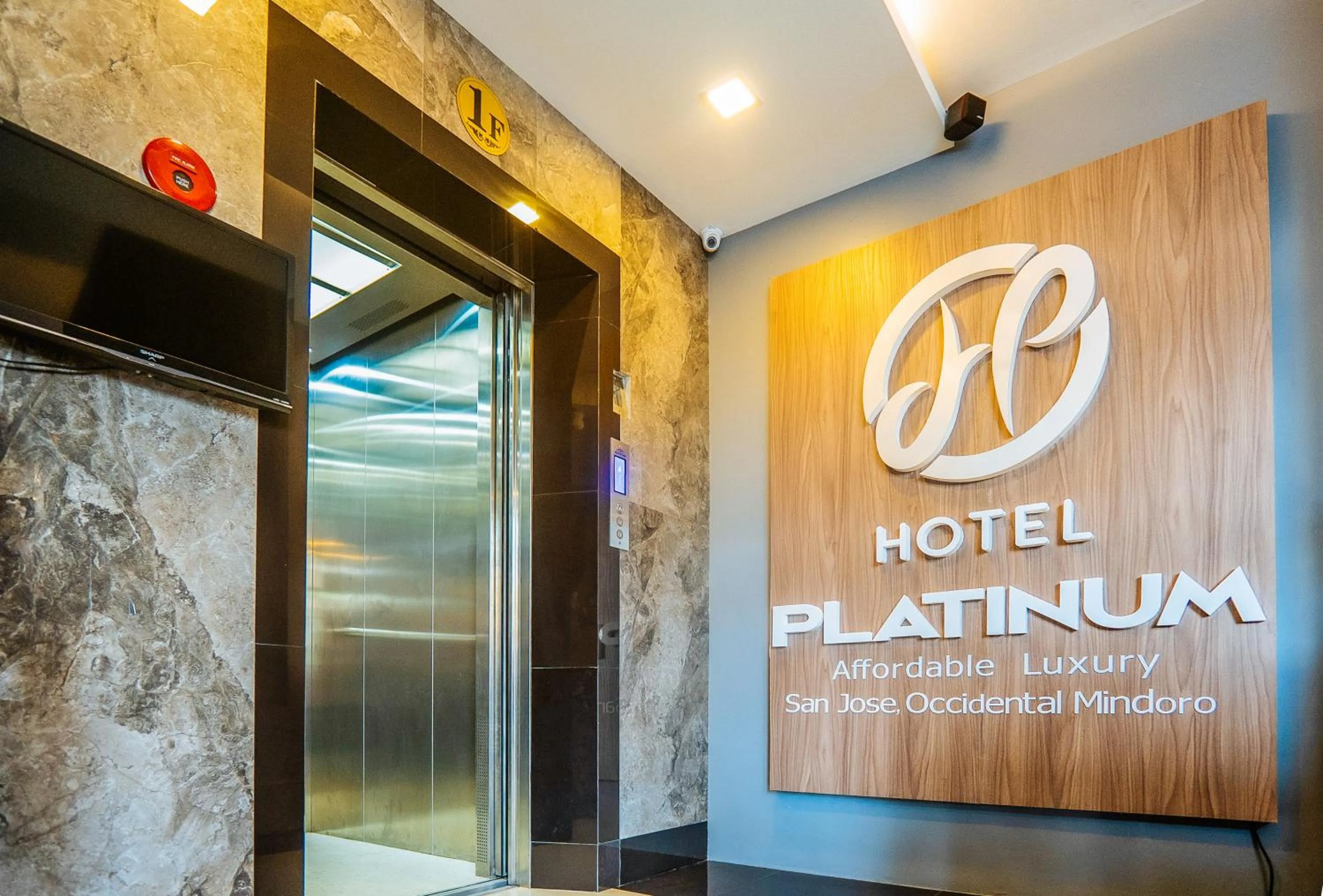 Property logo or sign in RedDoorz Plus @ Hotel Platinum Occidental Mindoro