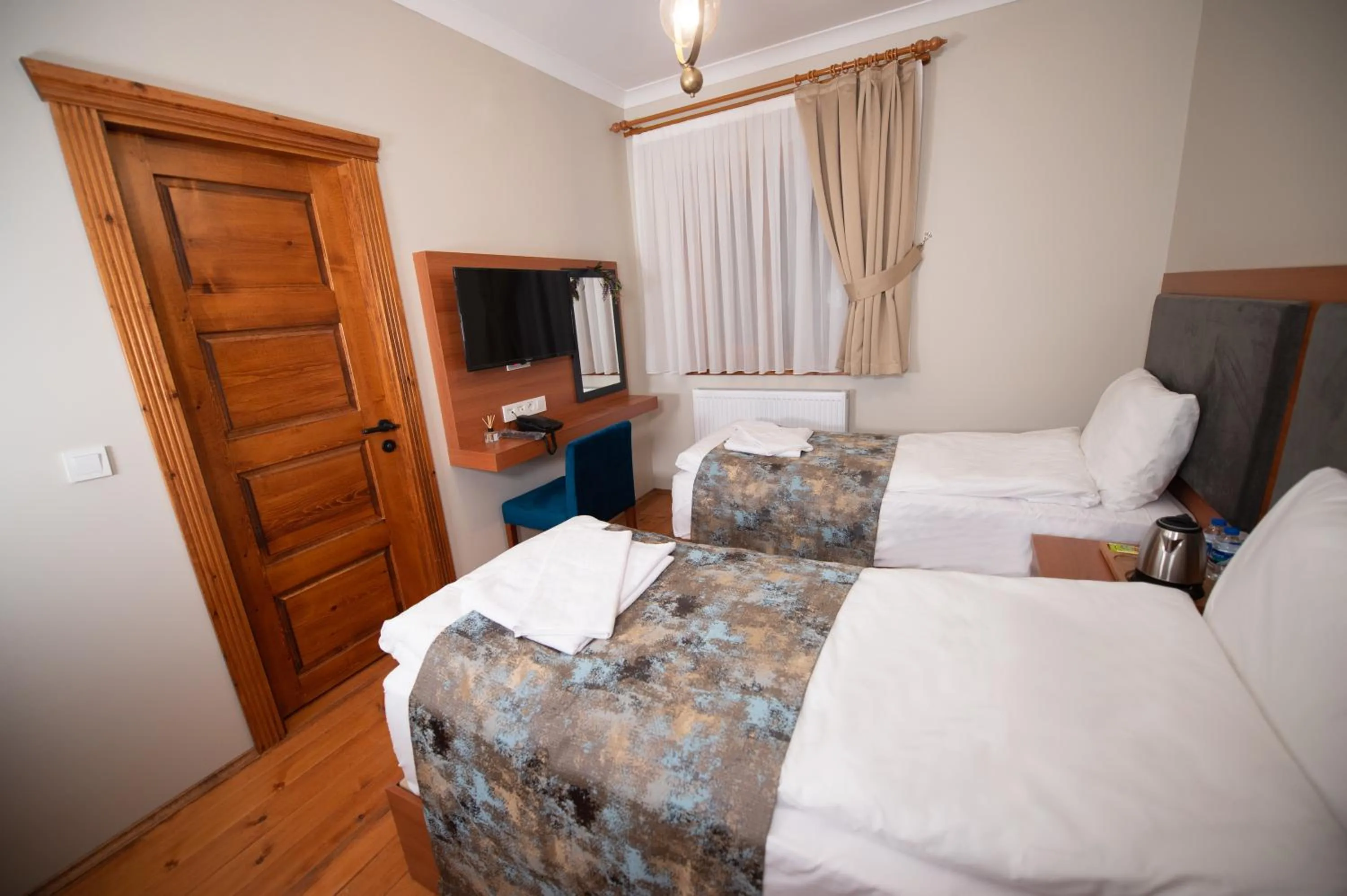 Bed in AHISKA PALAS OTEL