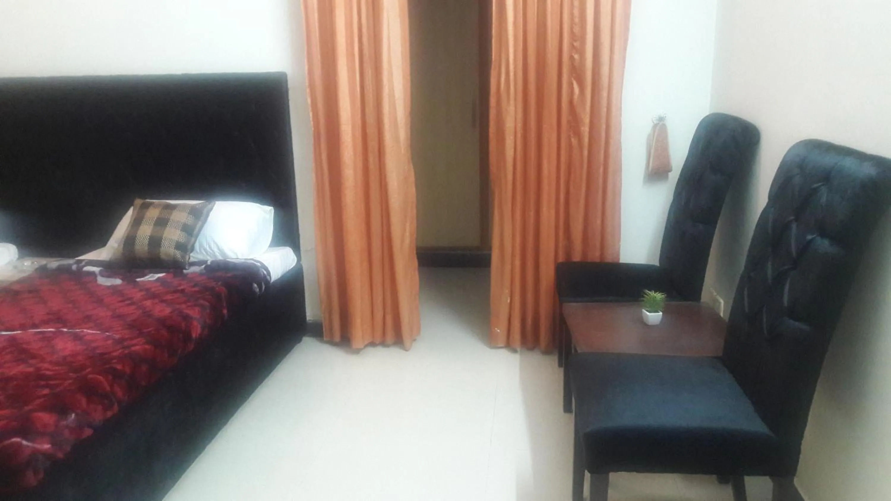 Bed in MUDAN Residency
