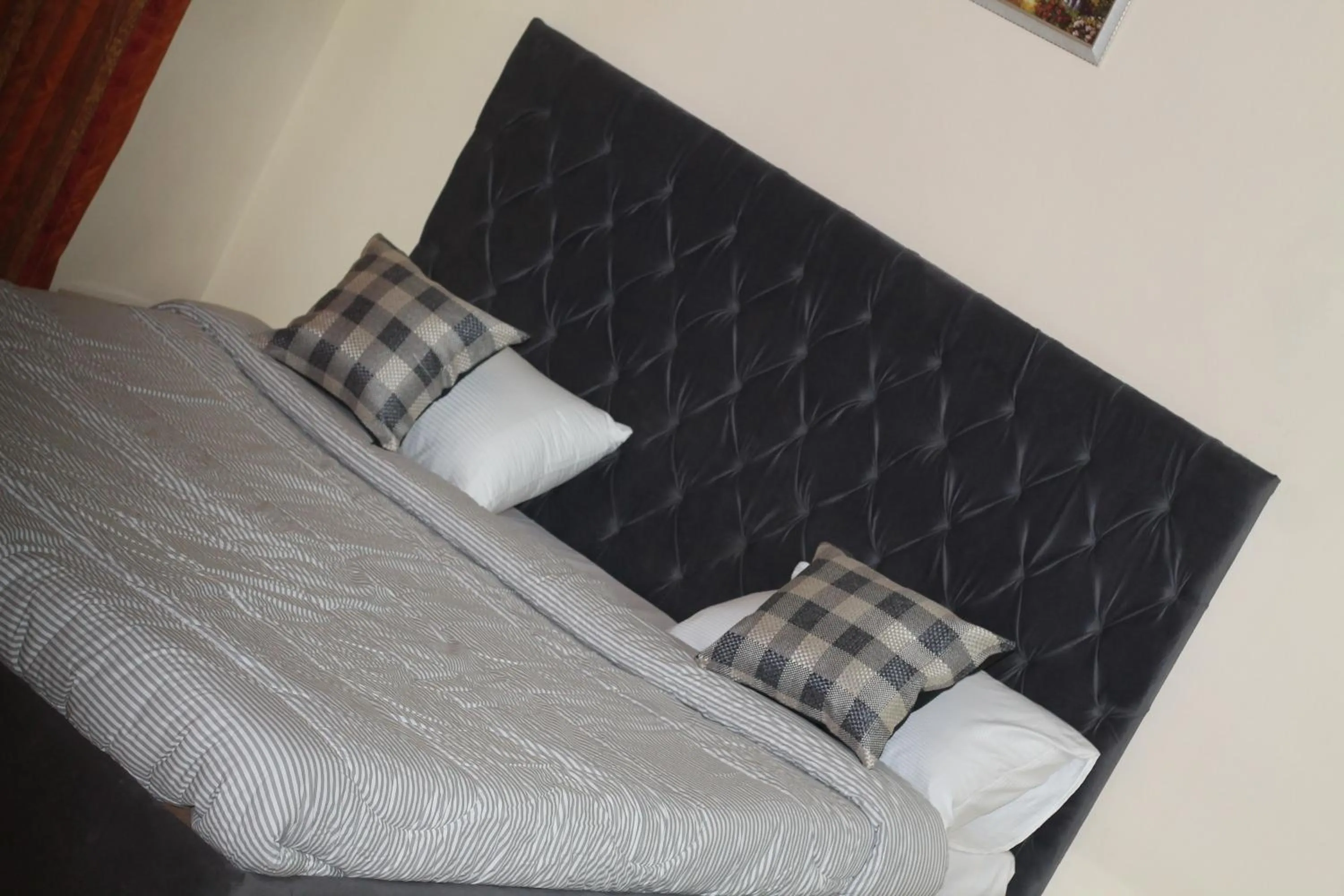 Bed in MUDAN Residency