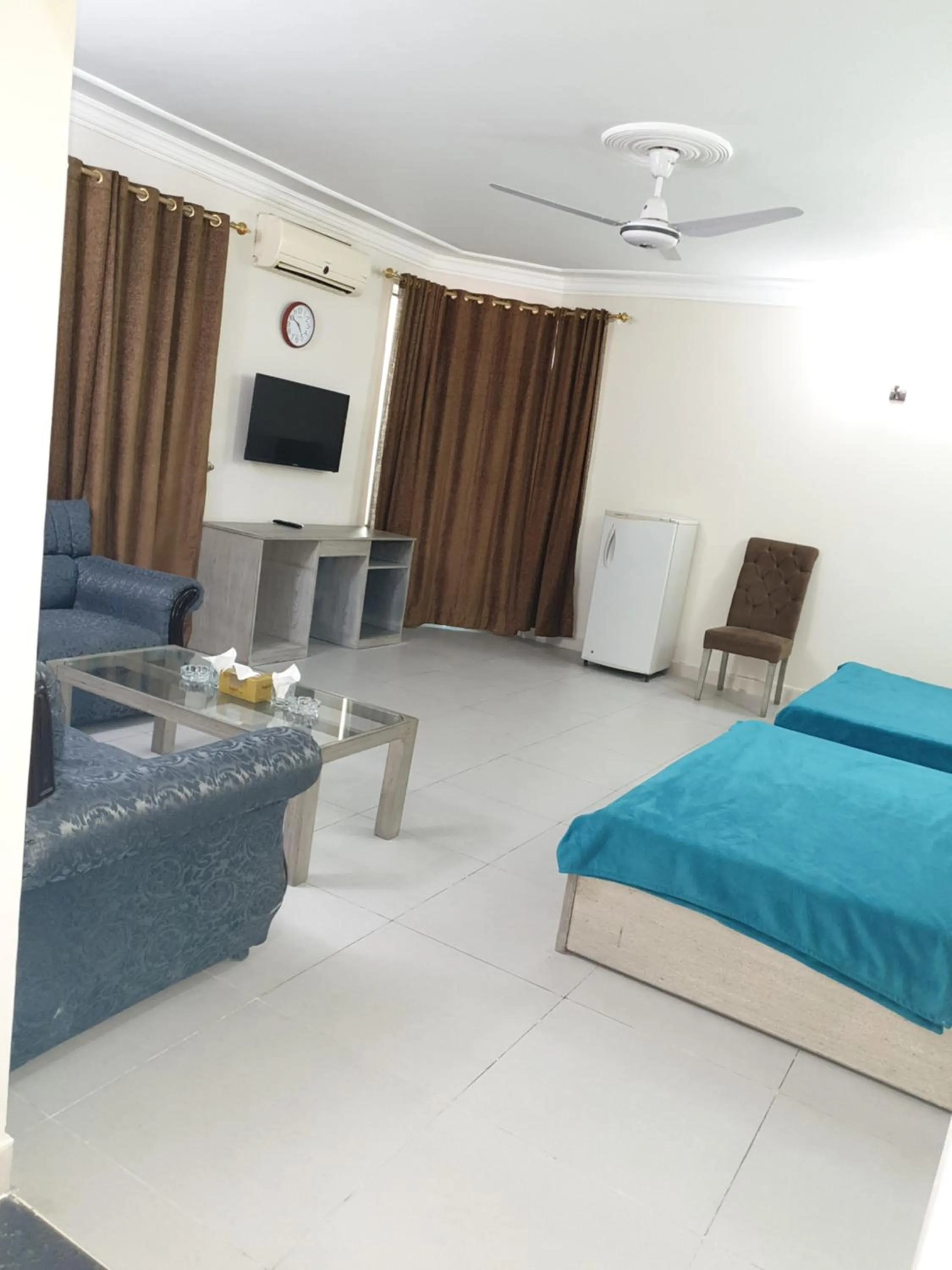 Bed in MUDAN Residency