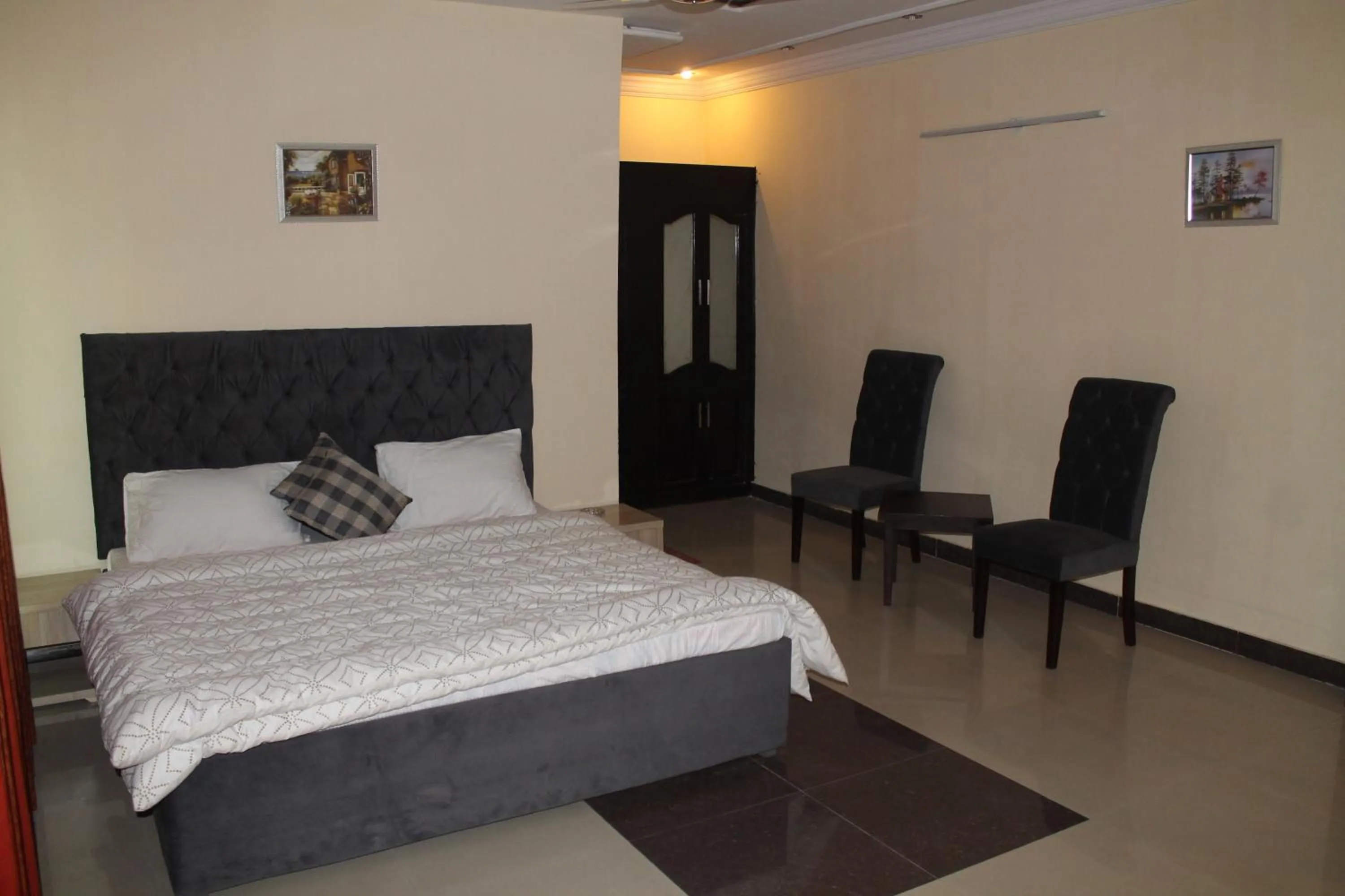 Bed in MUDAN Residency