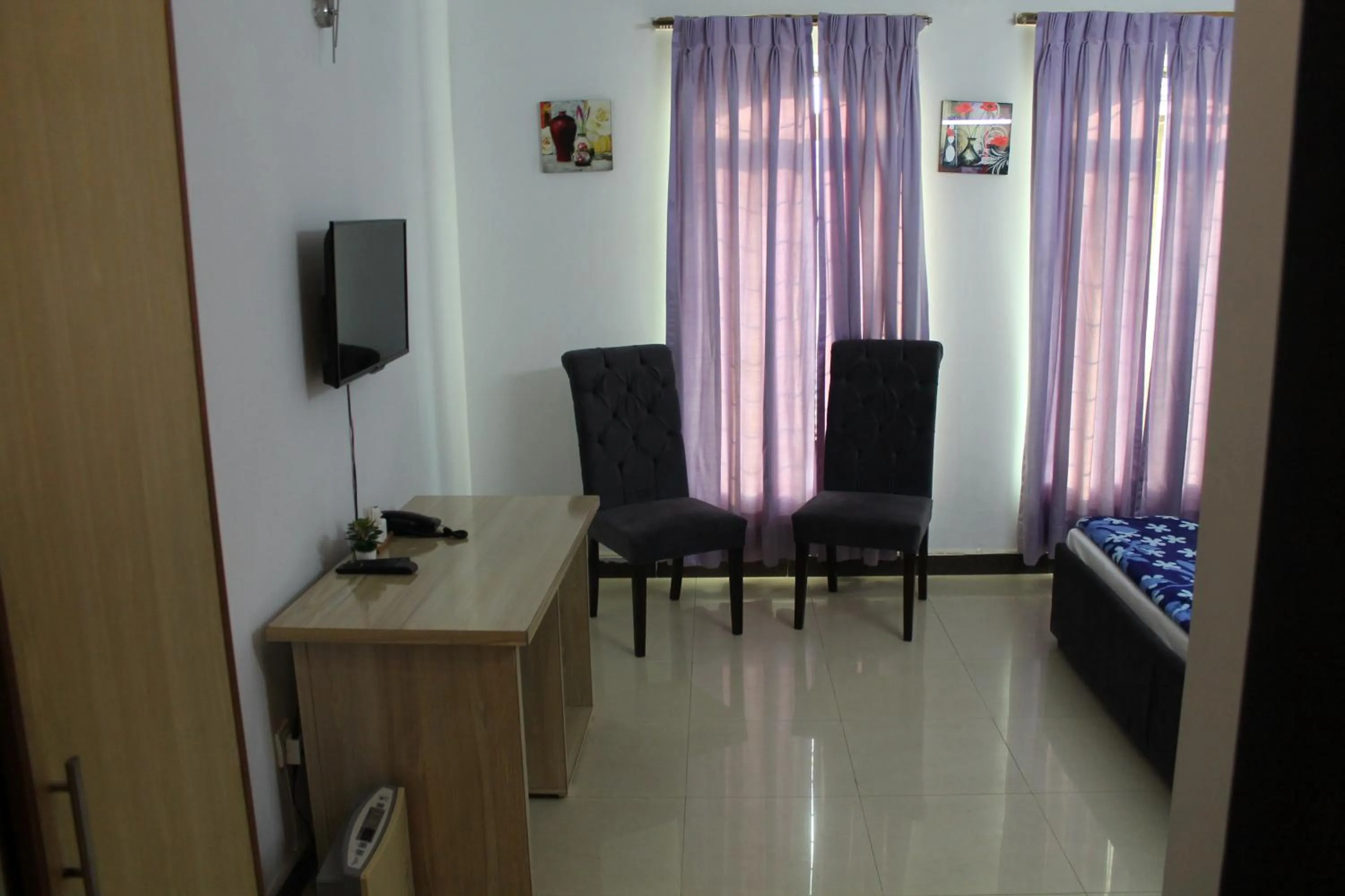 Bed in MUDAN Residency