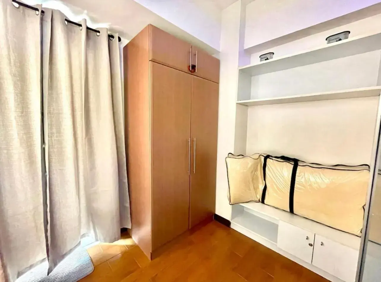 wardrobe, Bed in Luxury 1BR Unit with Pool at Venice Luxury Residences, Tower Domenico, McKinley Hill, Taguig City wardrobe, Bed in Luxury 1BR Unit with Pool at Venice Luxury Residences, Tower Domenico, McKinley Hill, Taguig City