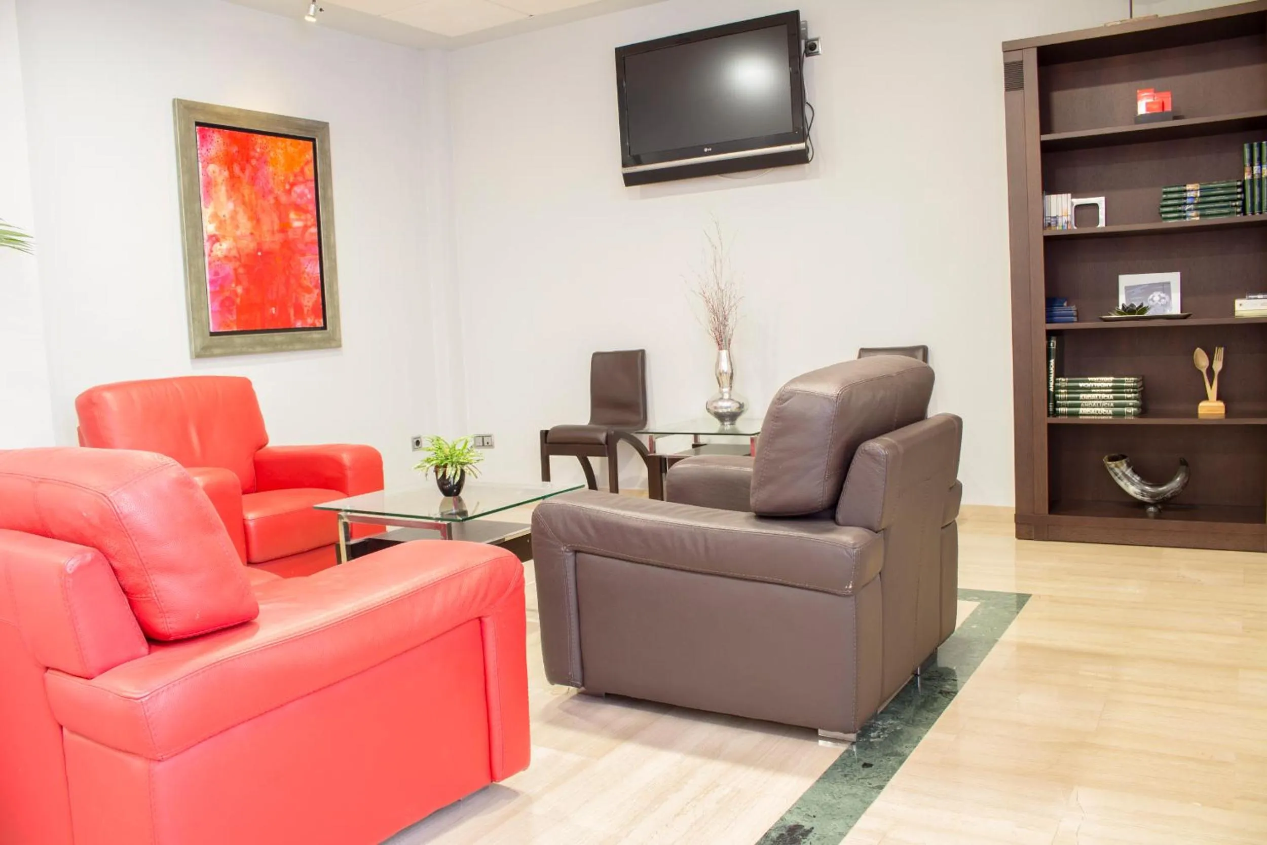 Communal lounge/ TV room in Hotel Carmen