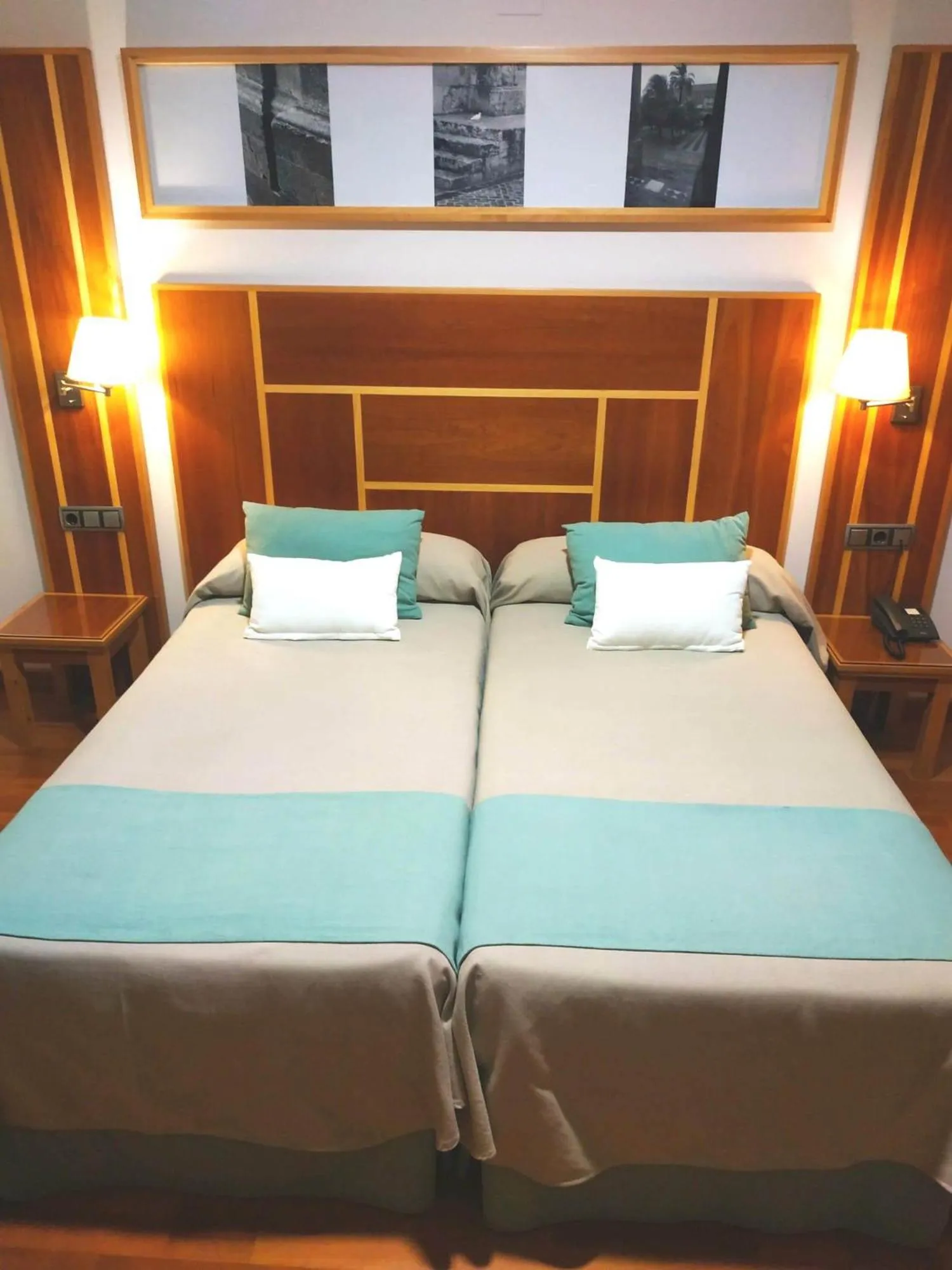 Bed in Hotel Carmen