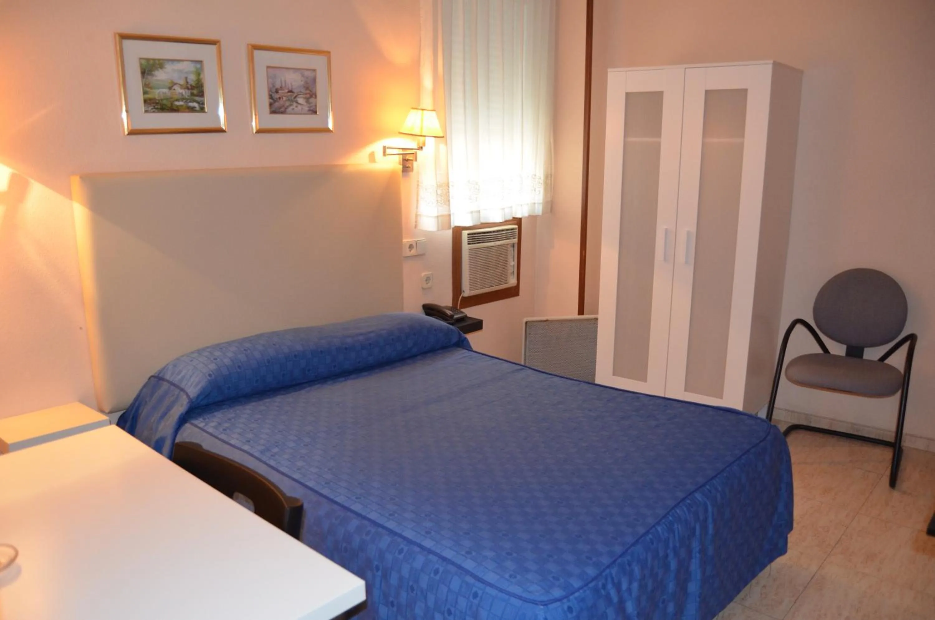 Photo of the whole room, Bed in Hotel Legazpi