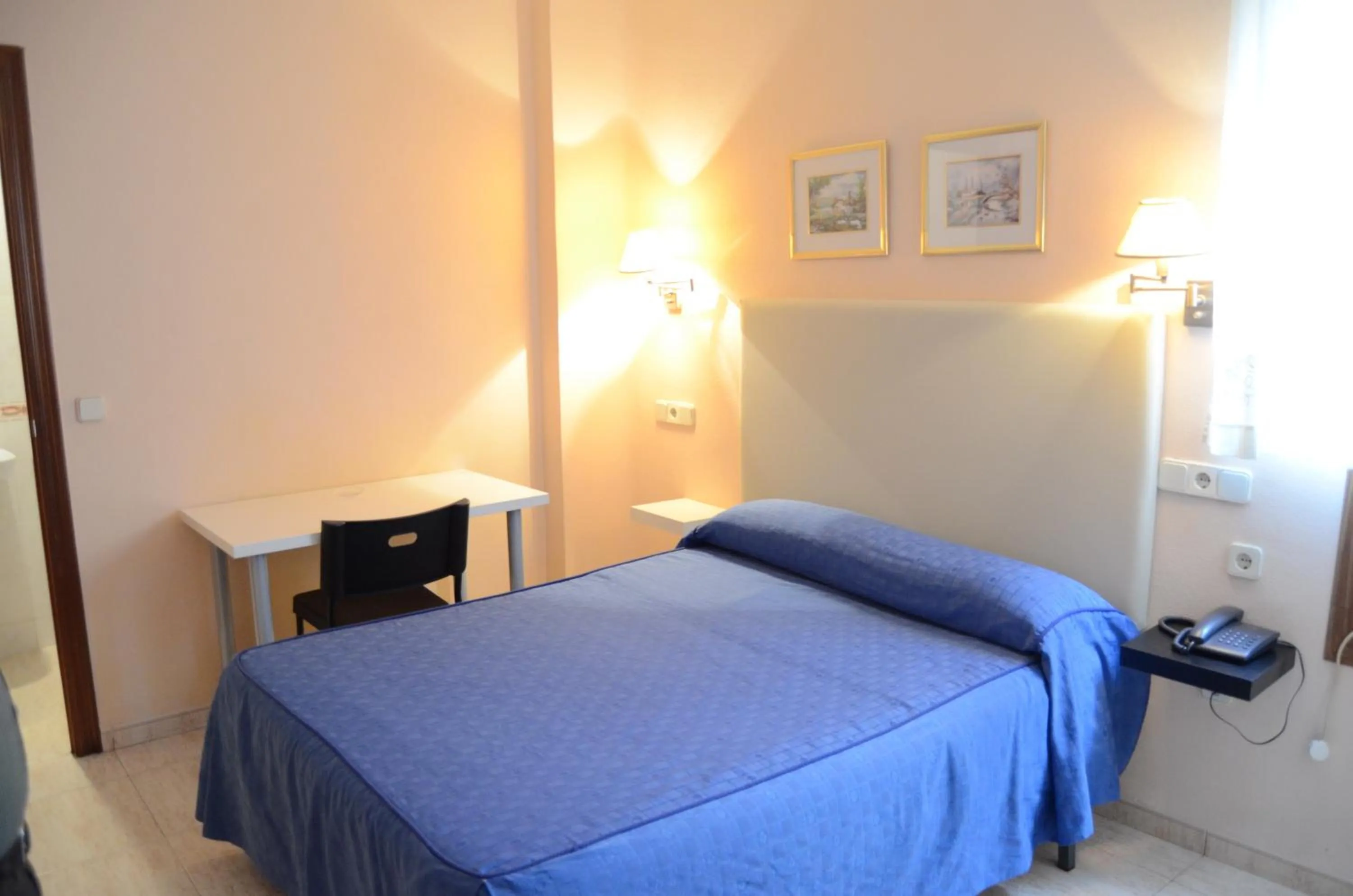 Photo of the whole room, Bed in Hotel Legazpi