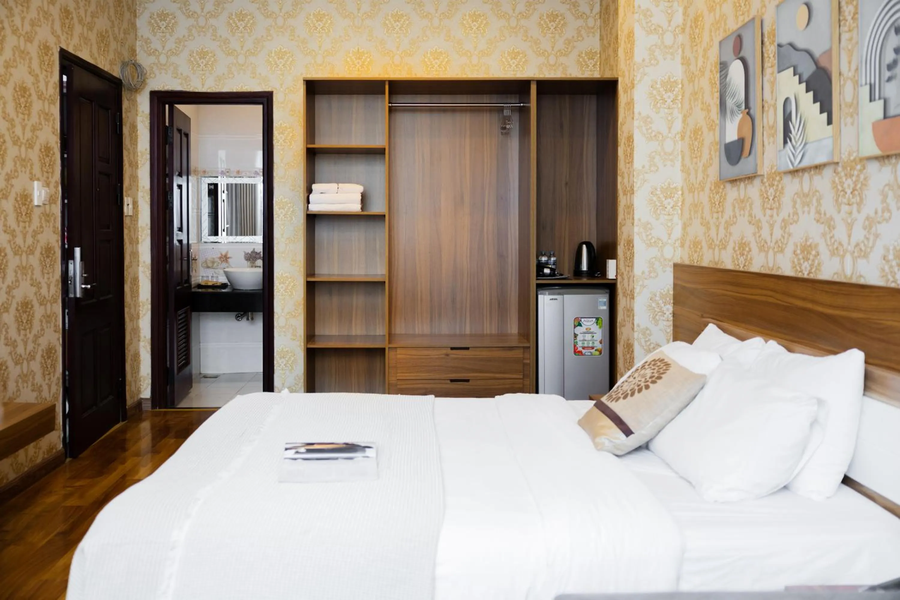 Bed in TTR Vincent Hotel