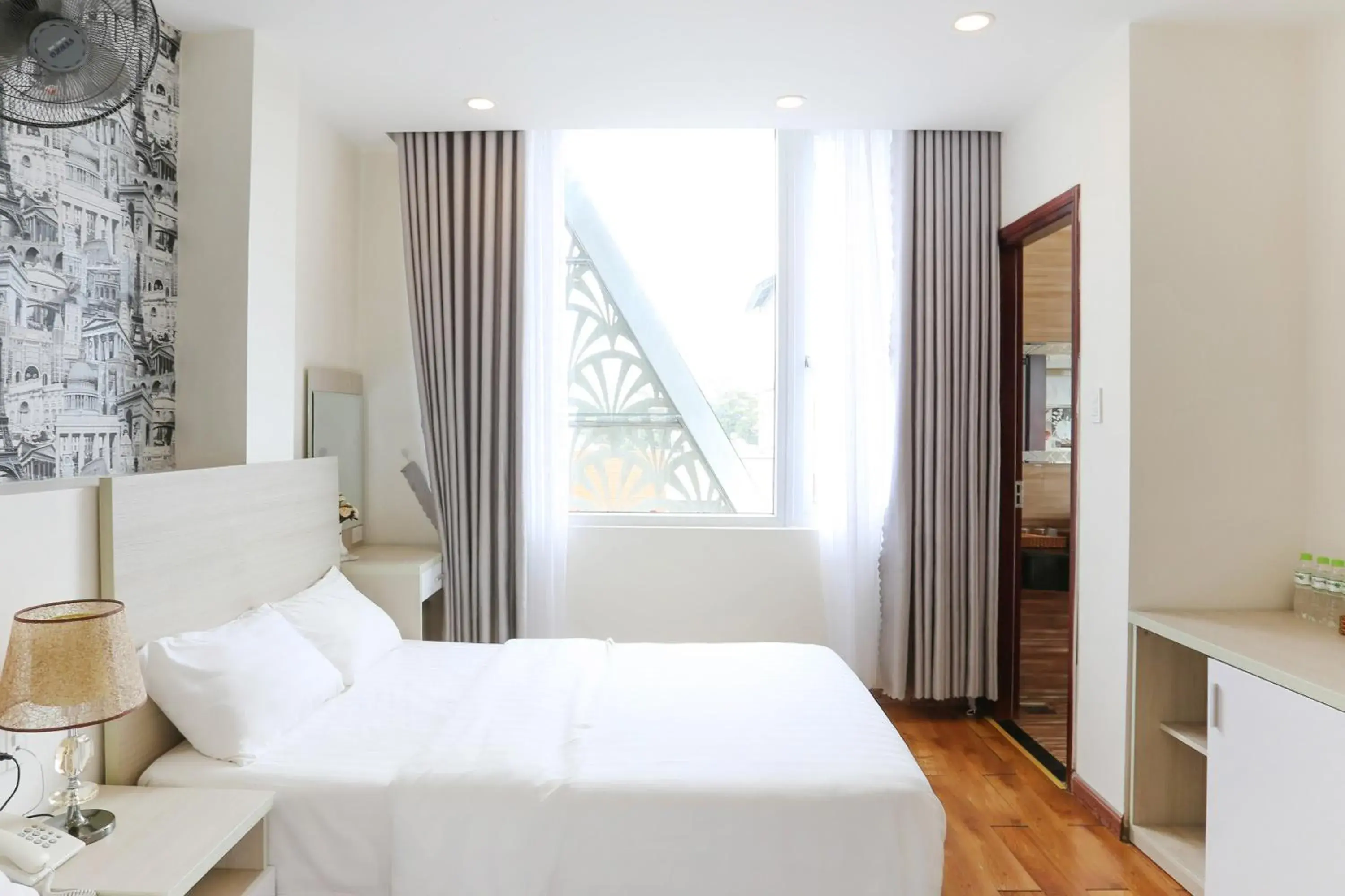 Bed in TTR Vincent Hotel Bed in TTR Vincent Hotel