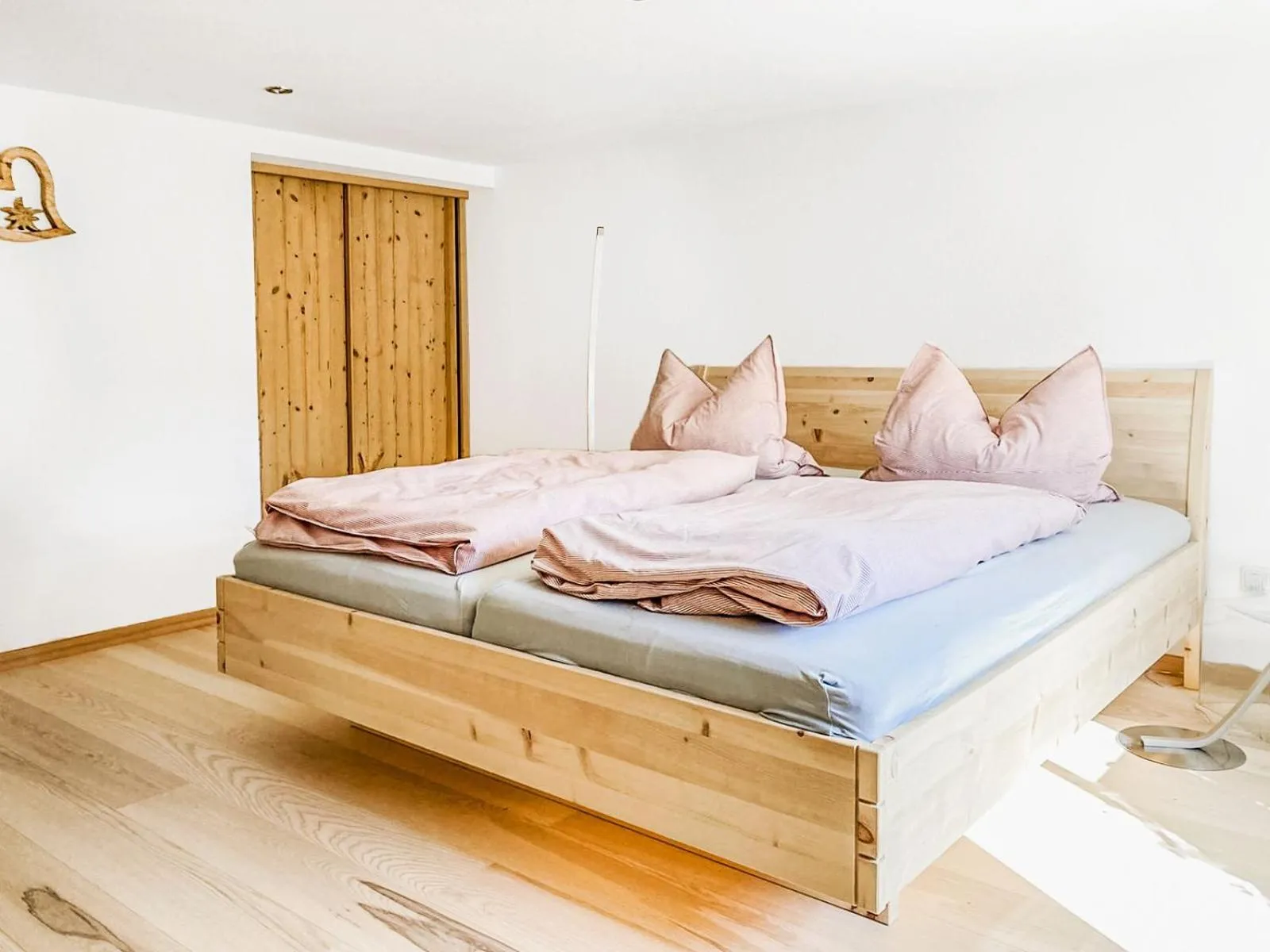Bed in Alpenflair Ferienwohnung 316 Stadlloft