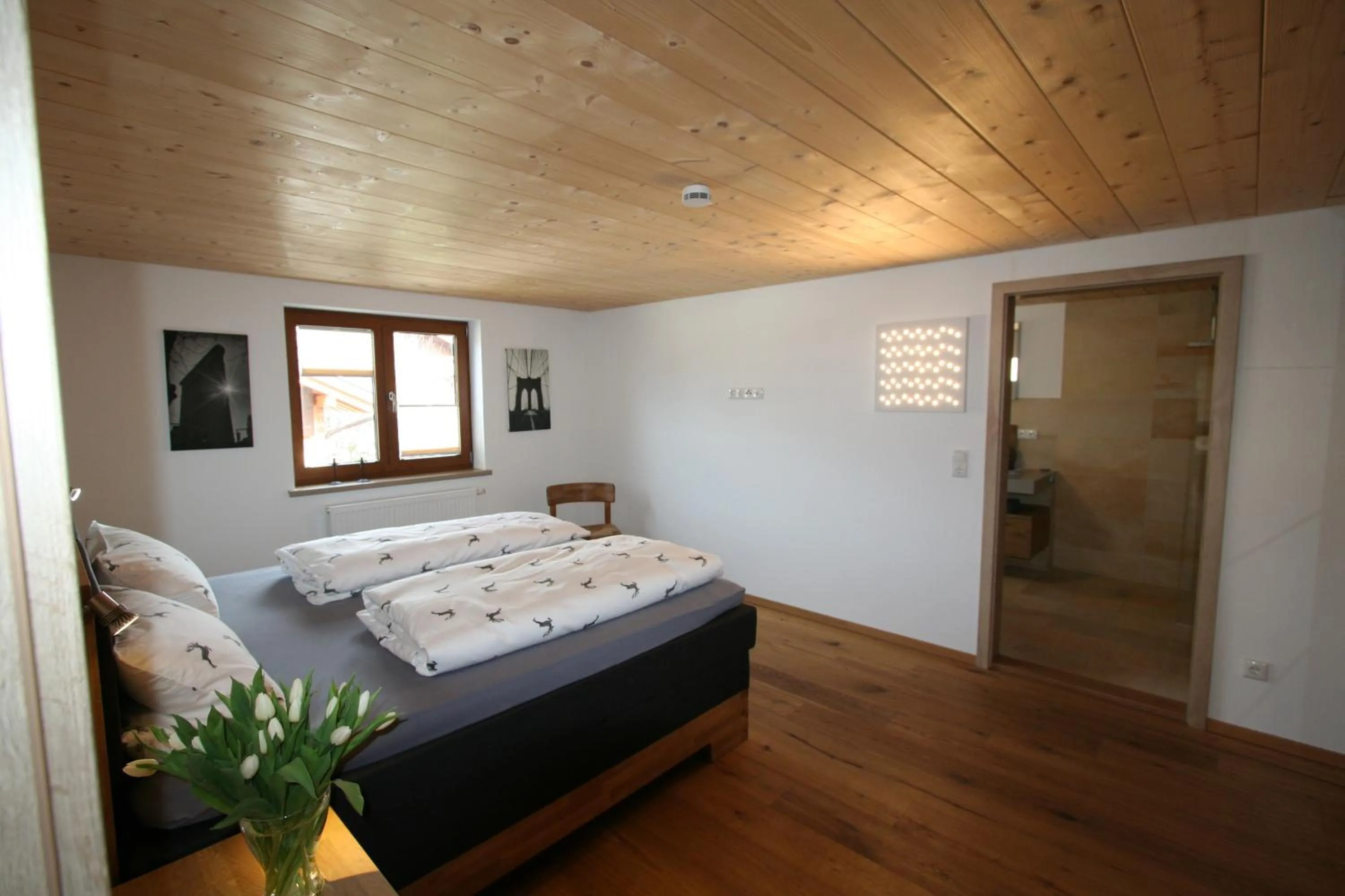 Bed in Alpenflair Ferienwohnung 316 Stadlloft