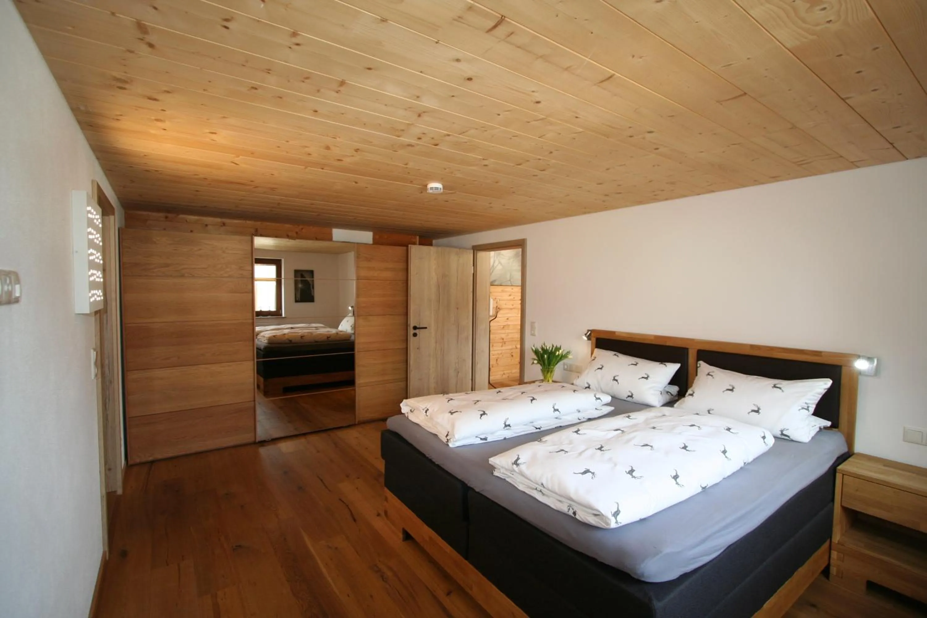 Bed in Alpenflair Ferienwohnung 316 Stadlloft