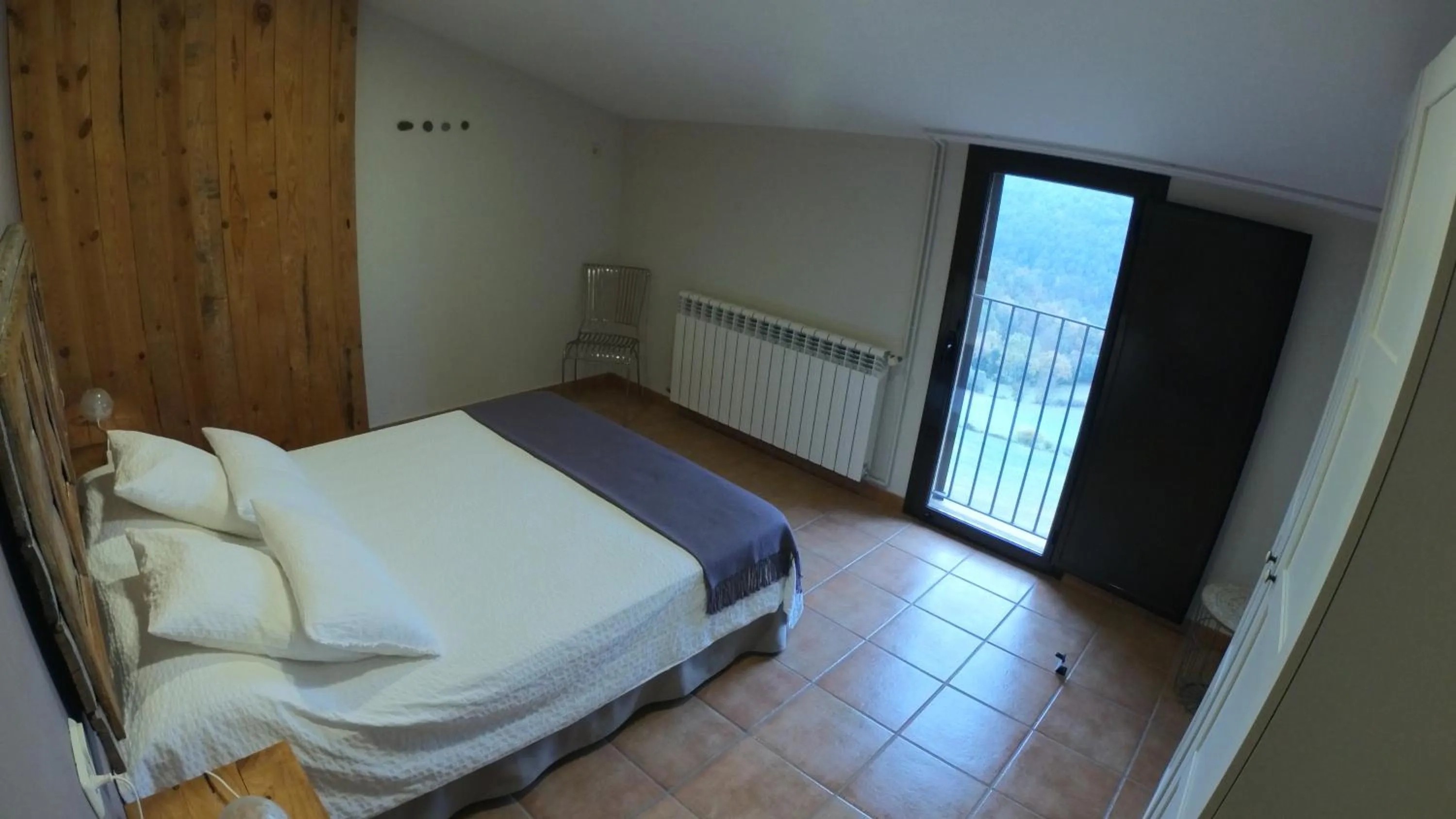 Photo of the whole room, Bed in Castell de Ceuró. Hotel Rural