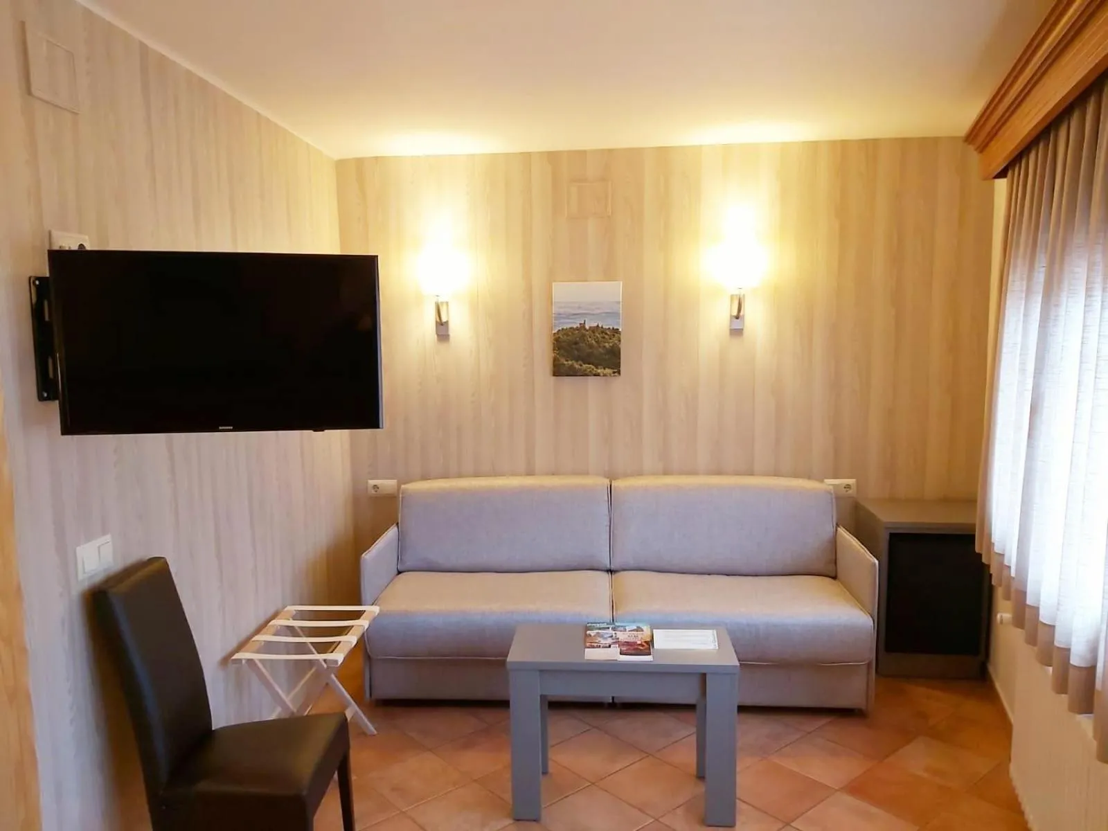 TV and multimedia in Hotel-Restaurante La Quadra
