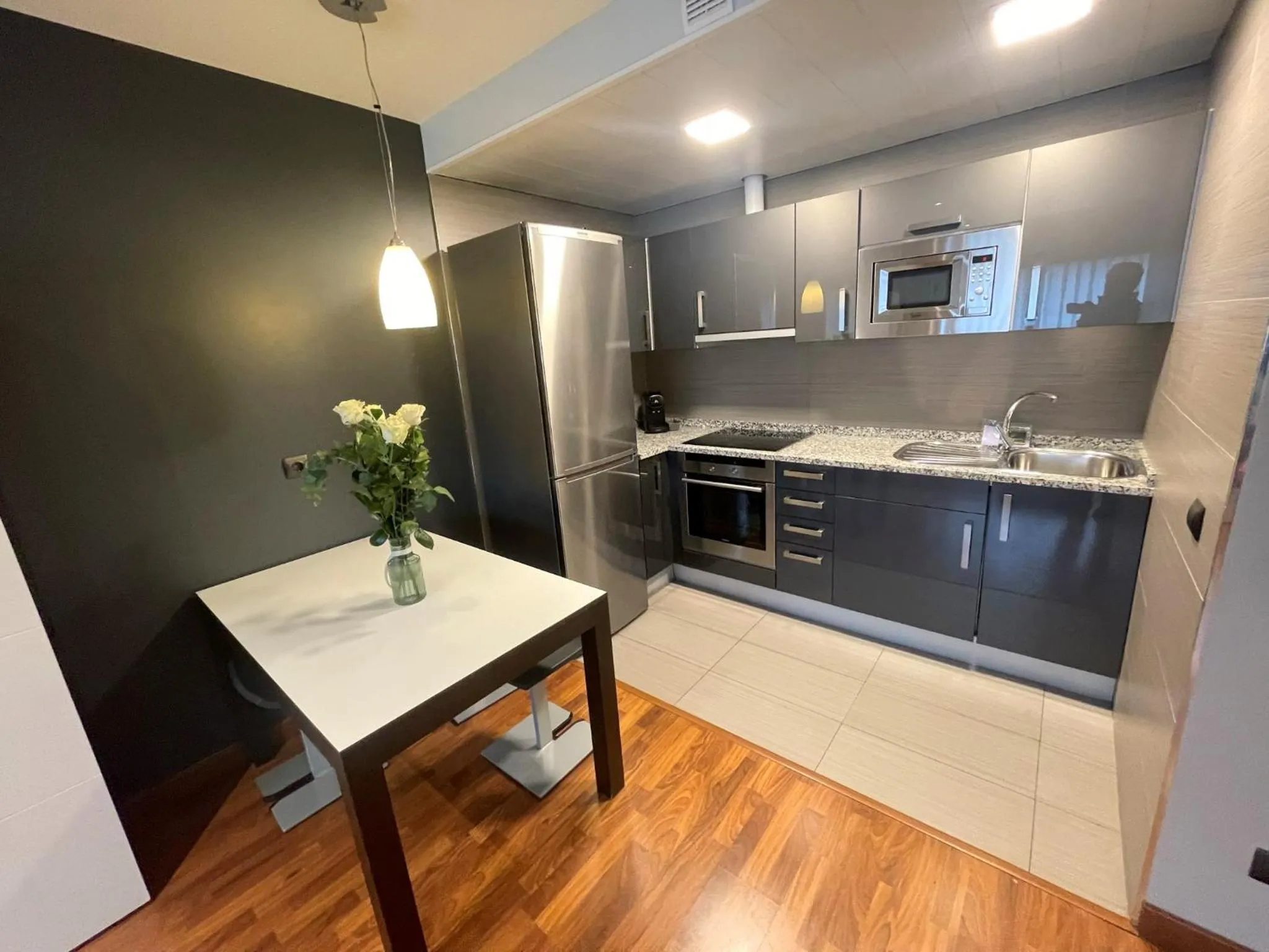 Kitchen or kitchenette in Hotel Apartamentos San Fermín Pamplona