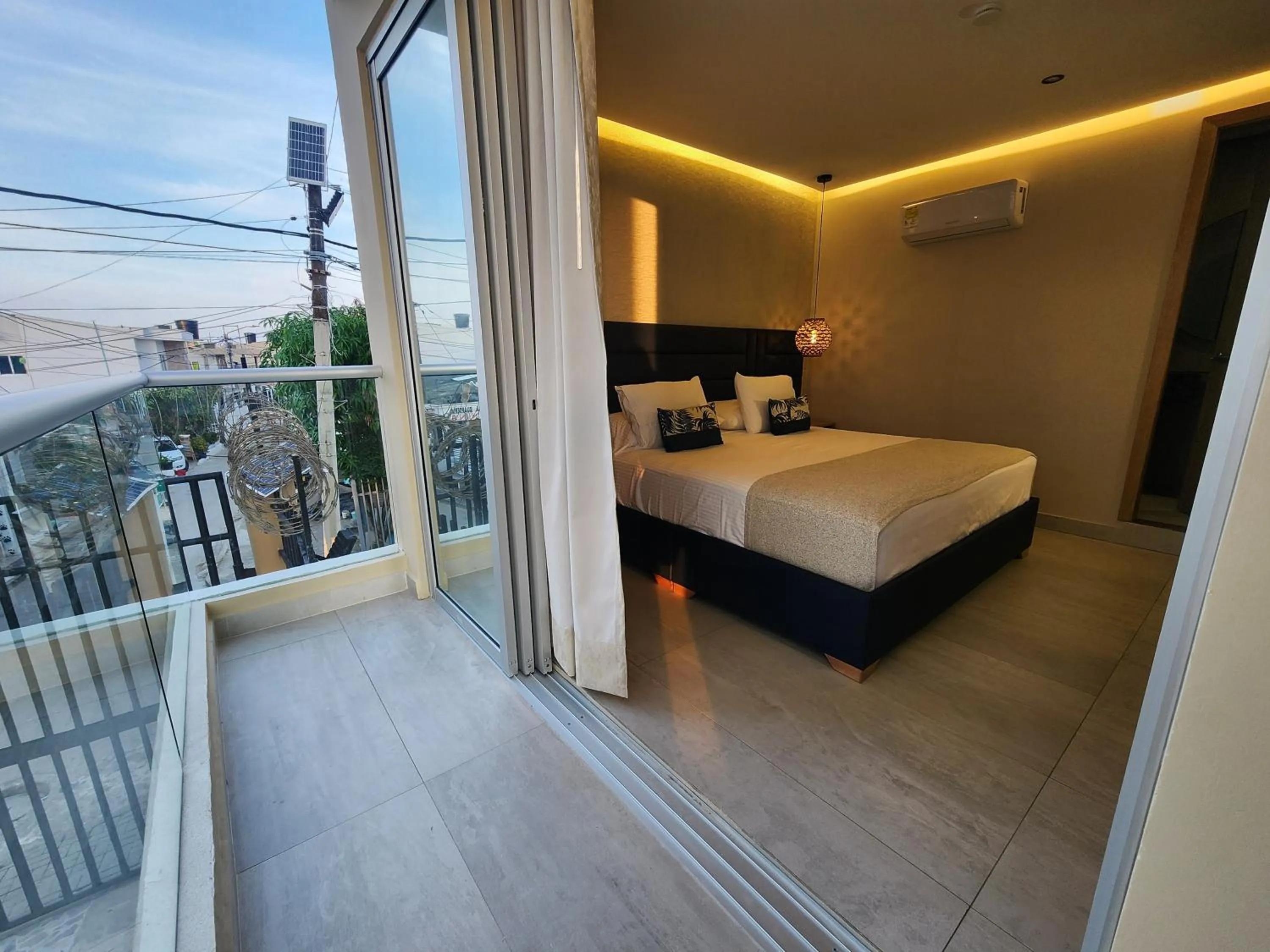 Balcony/Terrace, Bed in Hotel y Cabañas Covemar