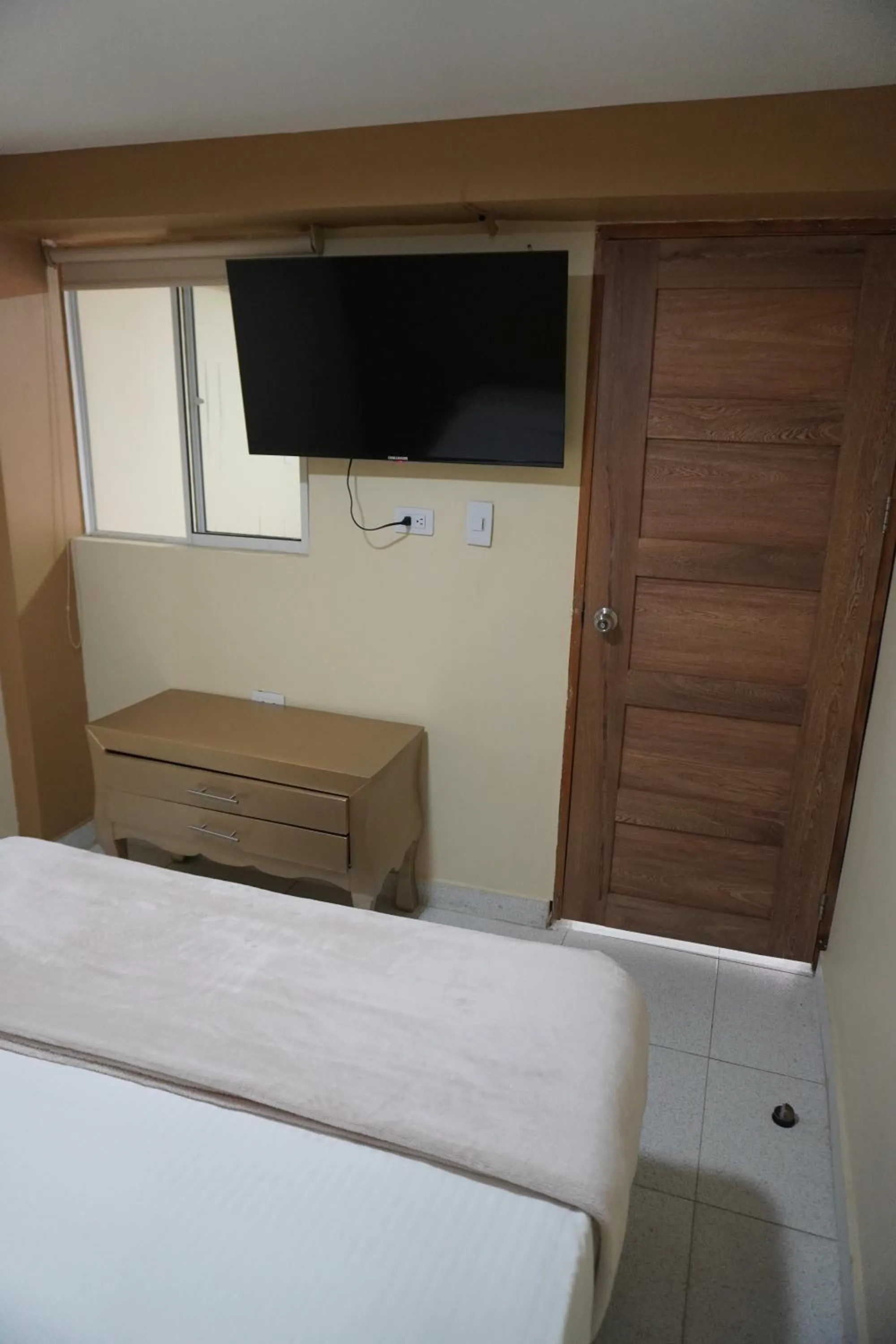 Bed in Hotel y Cabañas Covemar