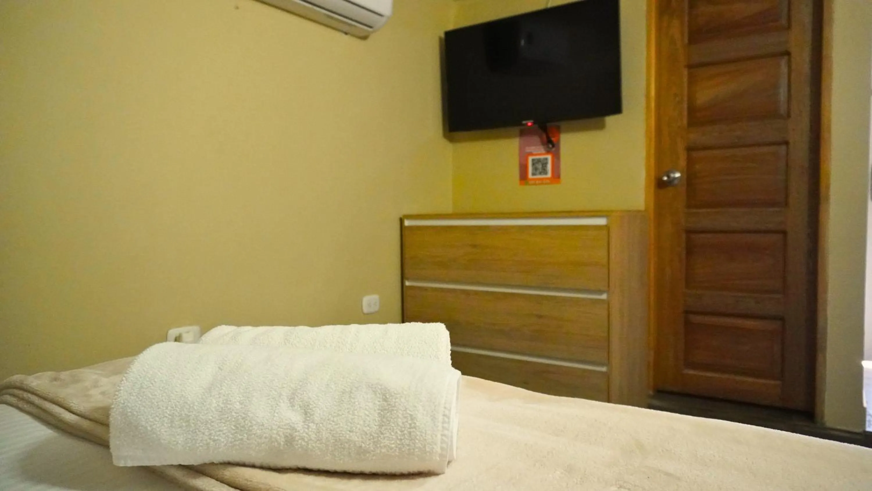 Bed in Hotel y Cabañas Covemar