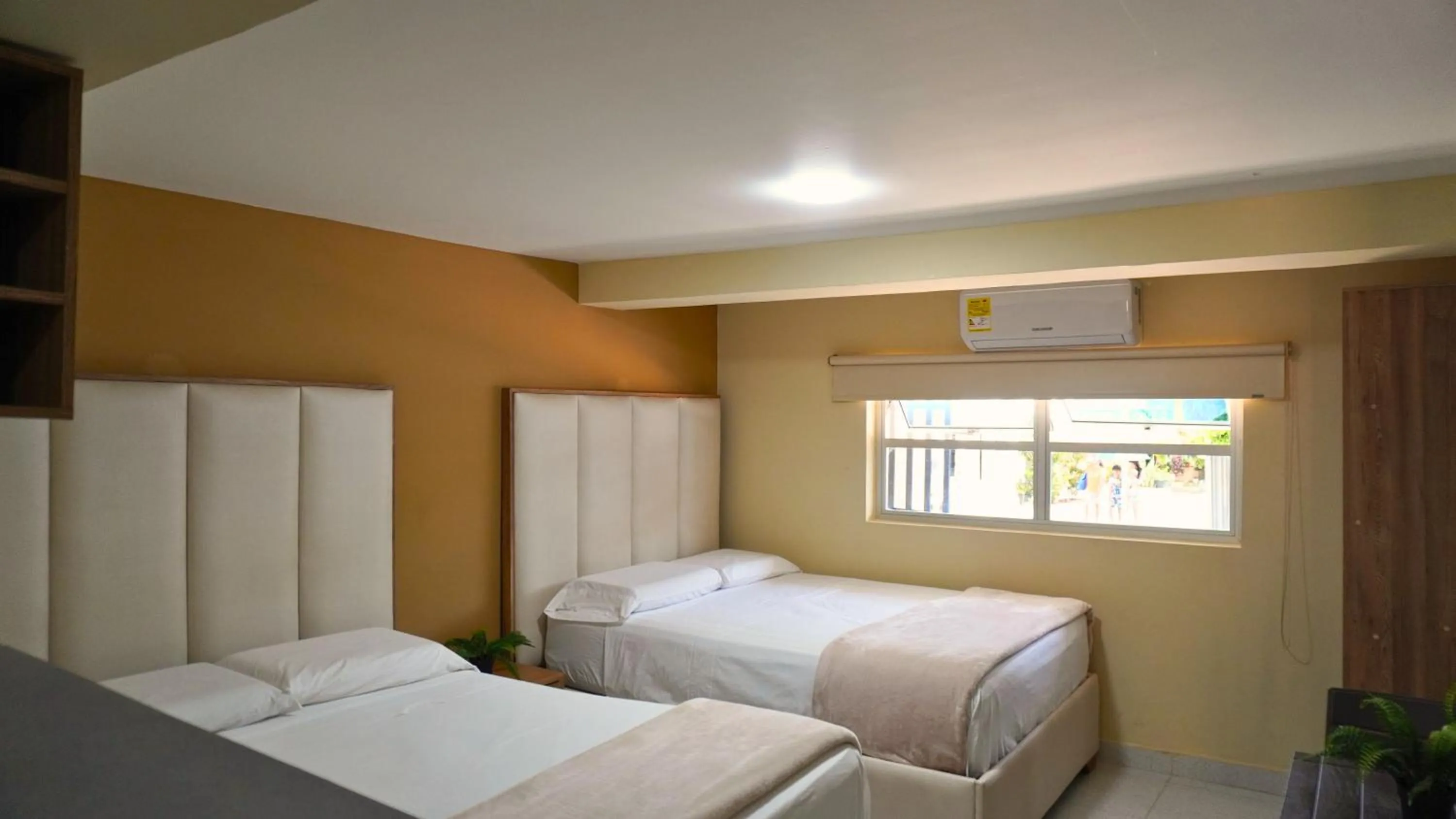 Bed in Hotel y Cabañas Covemar