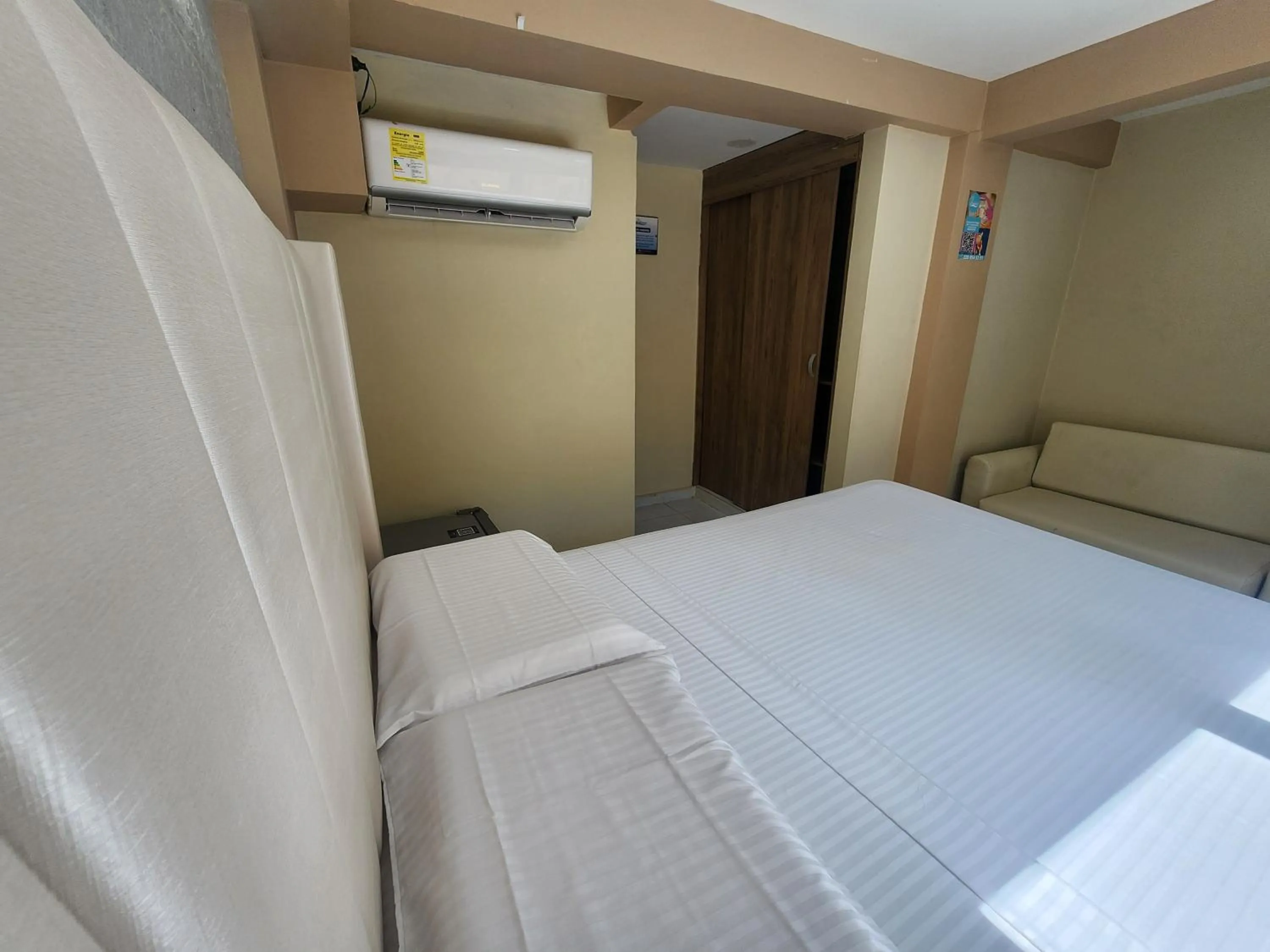 Bed in Hotel y Cabañas Covemar