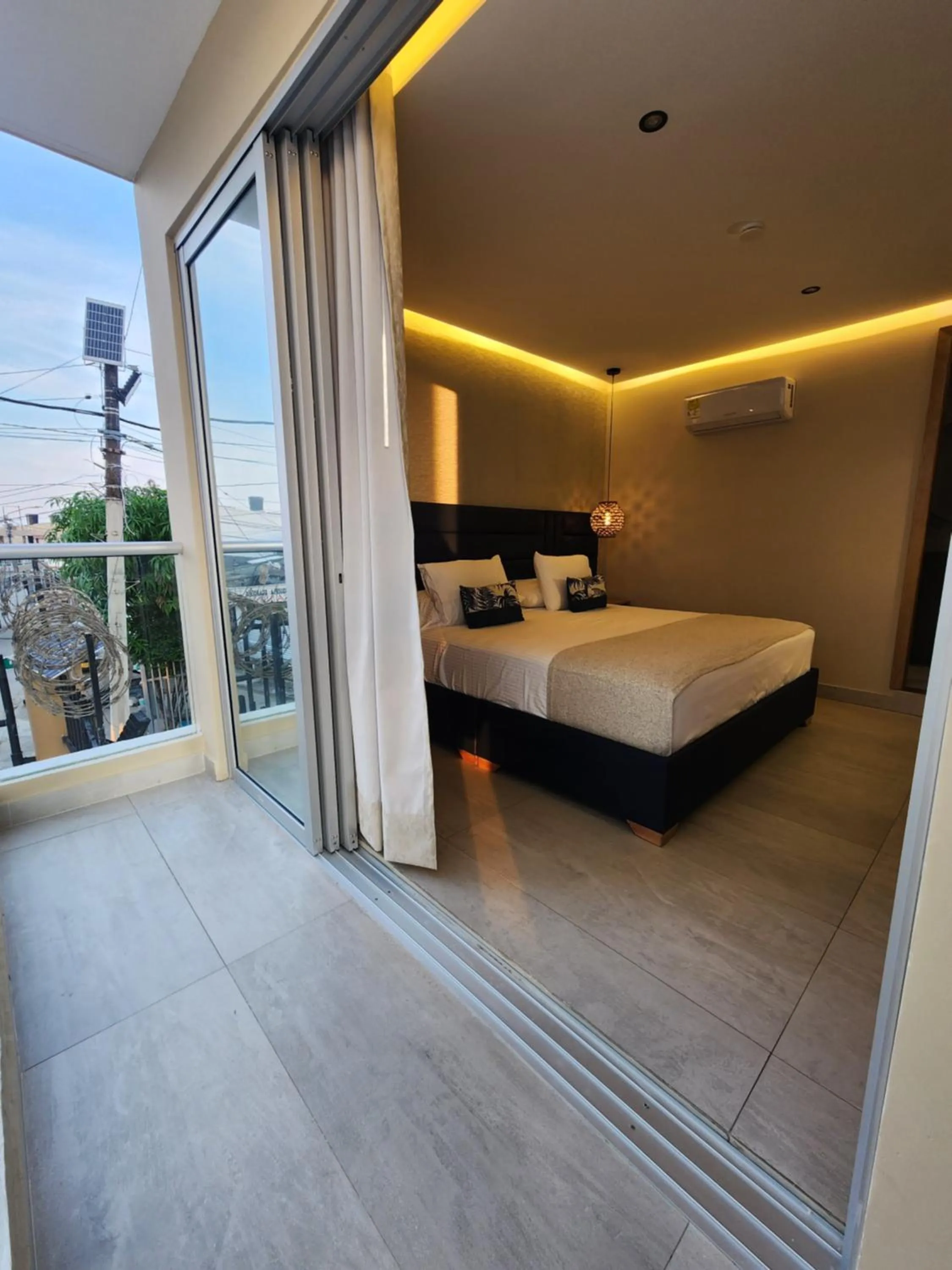 Balcony/Terrace, Bed in Hotel y Cabañas Covemar