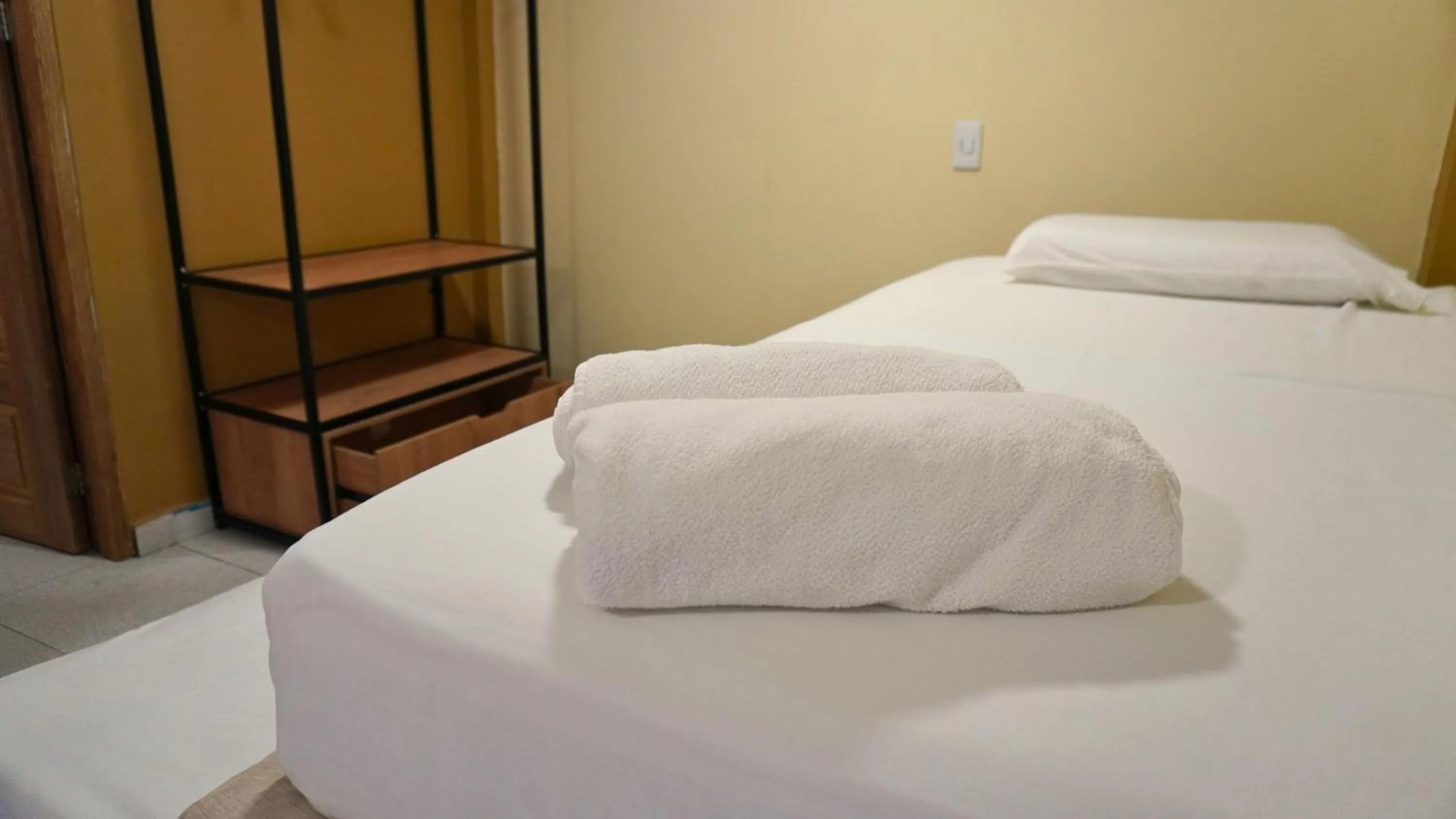 Bed in Hotel y Cabañas Covemar