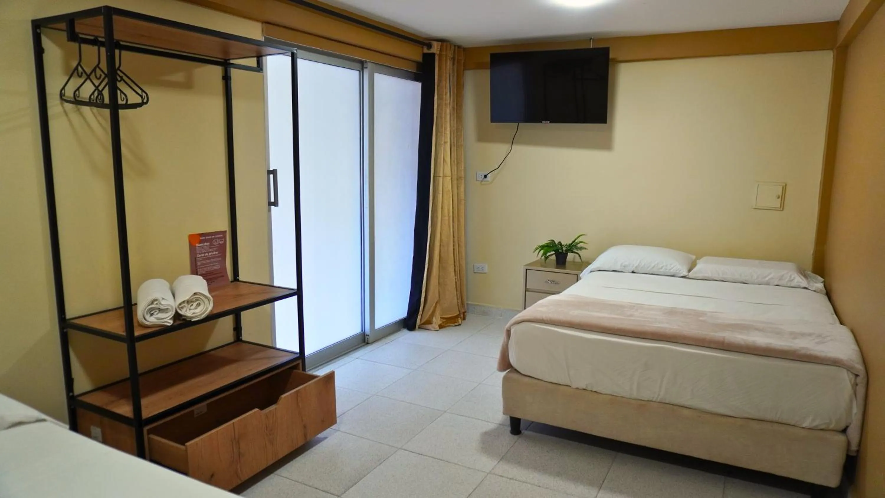 Bed in Hotel y Cabañas Covemar