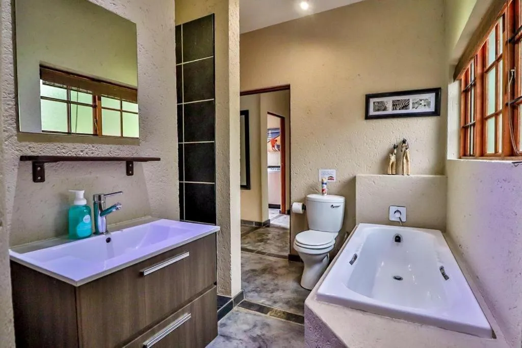Bathroom in Kruger Escape - Solar System