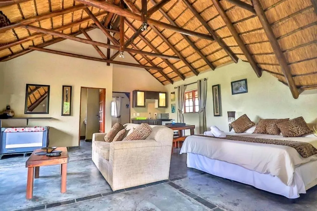 Photo of the whole room, Bed in Kruger Escape - Solar System
