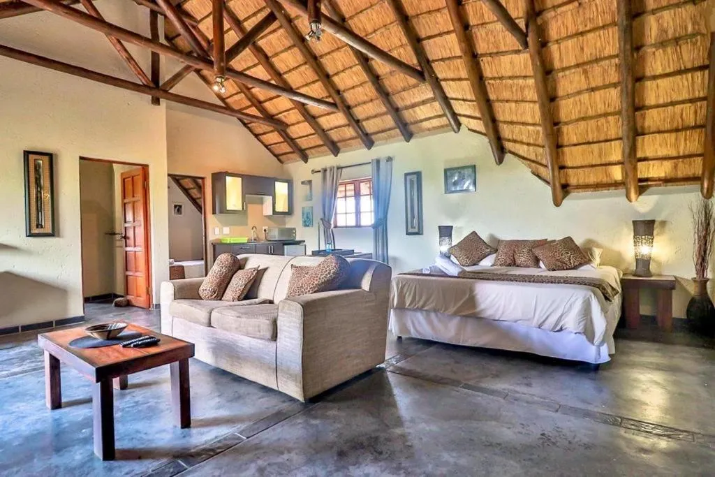 Photo of the whole room, Bed in Kruger Escape - Solar System