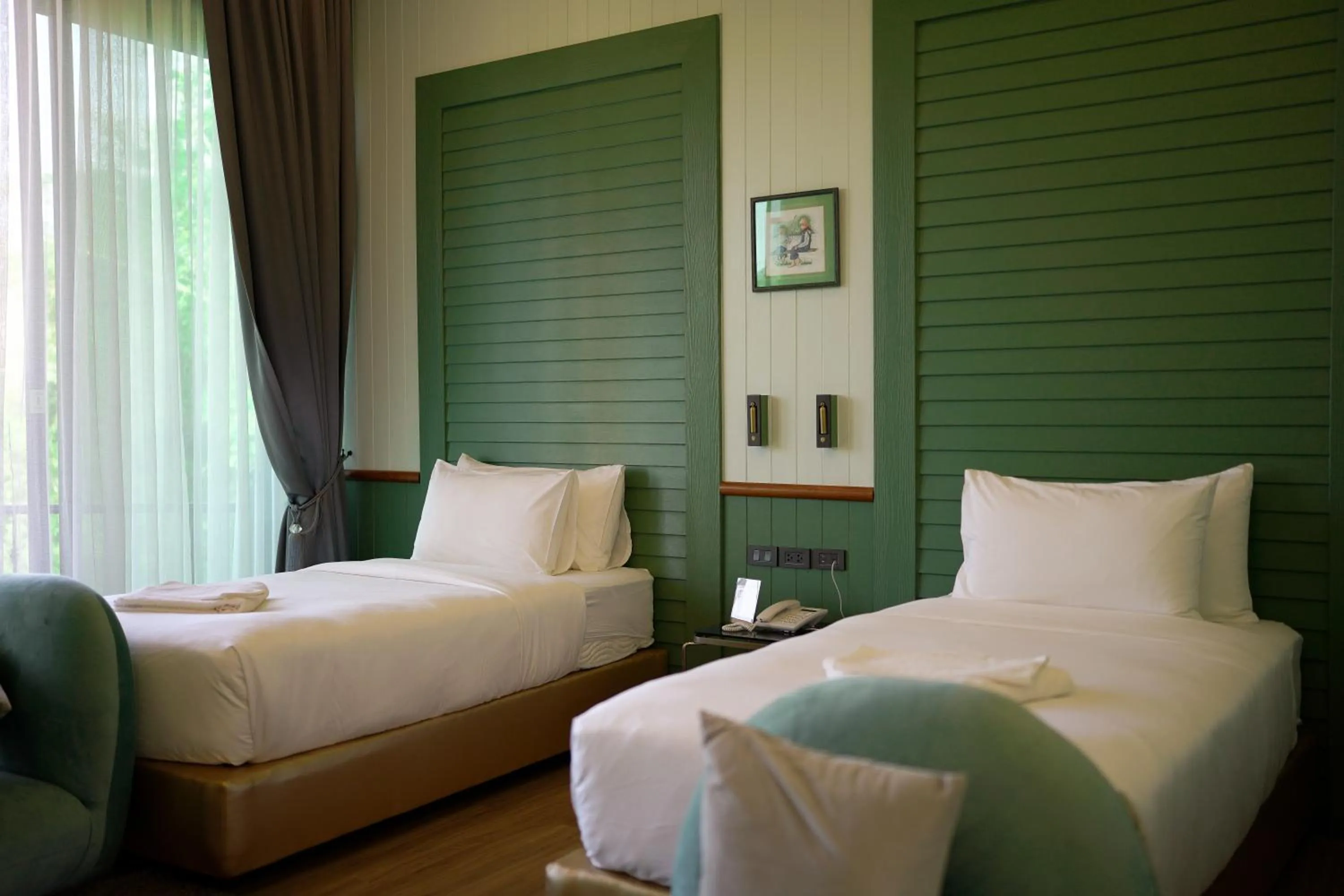 Bed in VeeVaree Riverkwai Resort