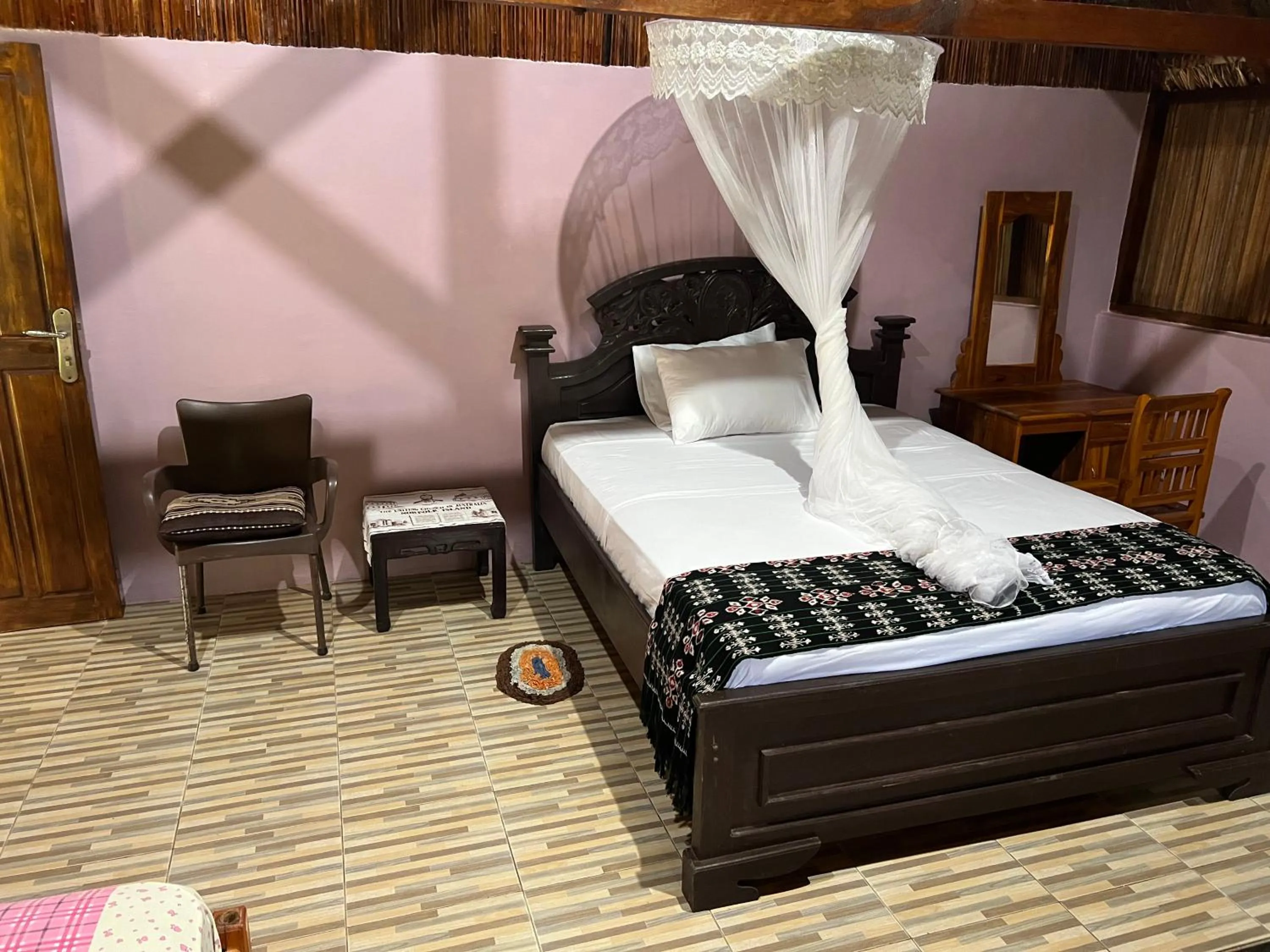 Photo of the whole room, Bed in Rote Surf Resort - Lualemba Bungalows
