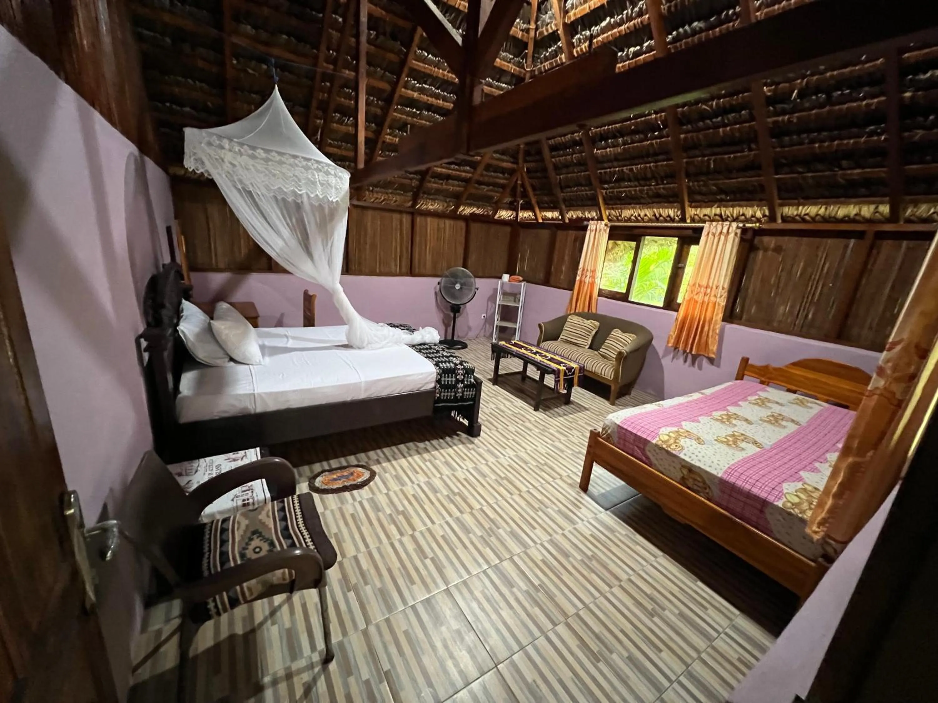 Bed in Rote Surf Resort - Lualemba Bungalows