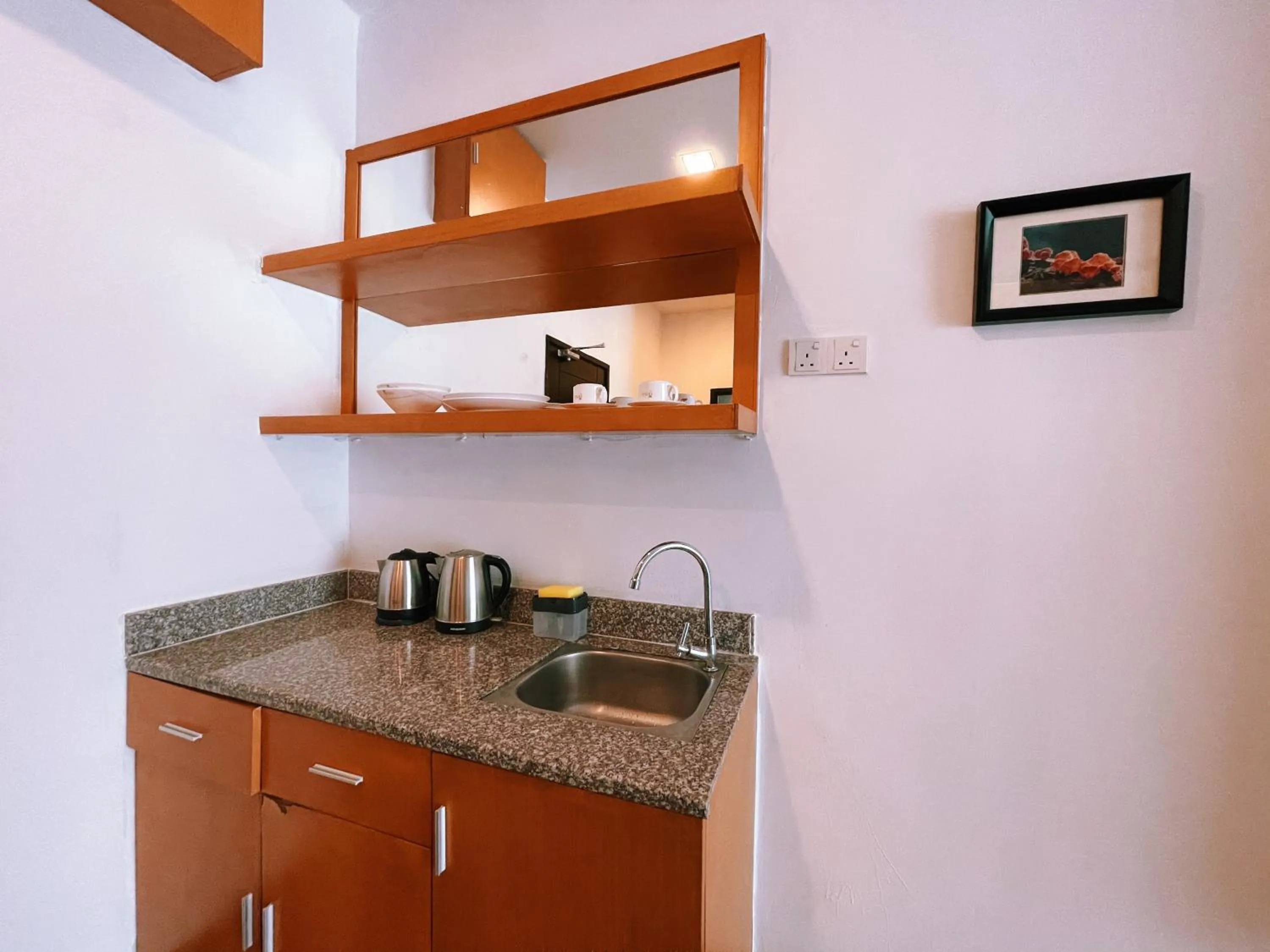 Kitchen or kitchenette in NOVA Apartment at Cameron