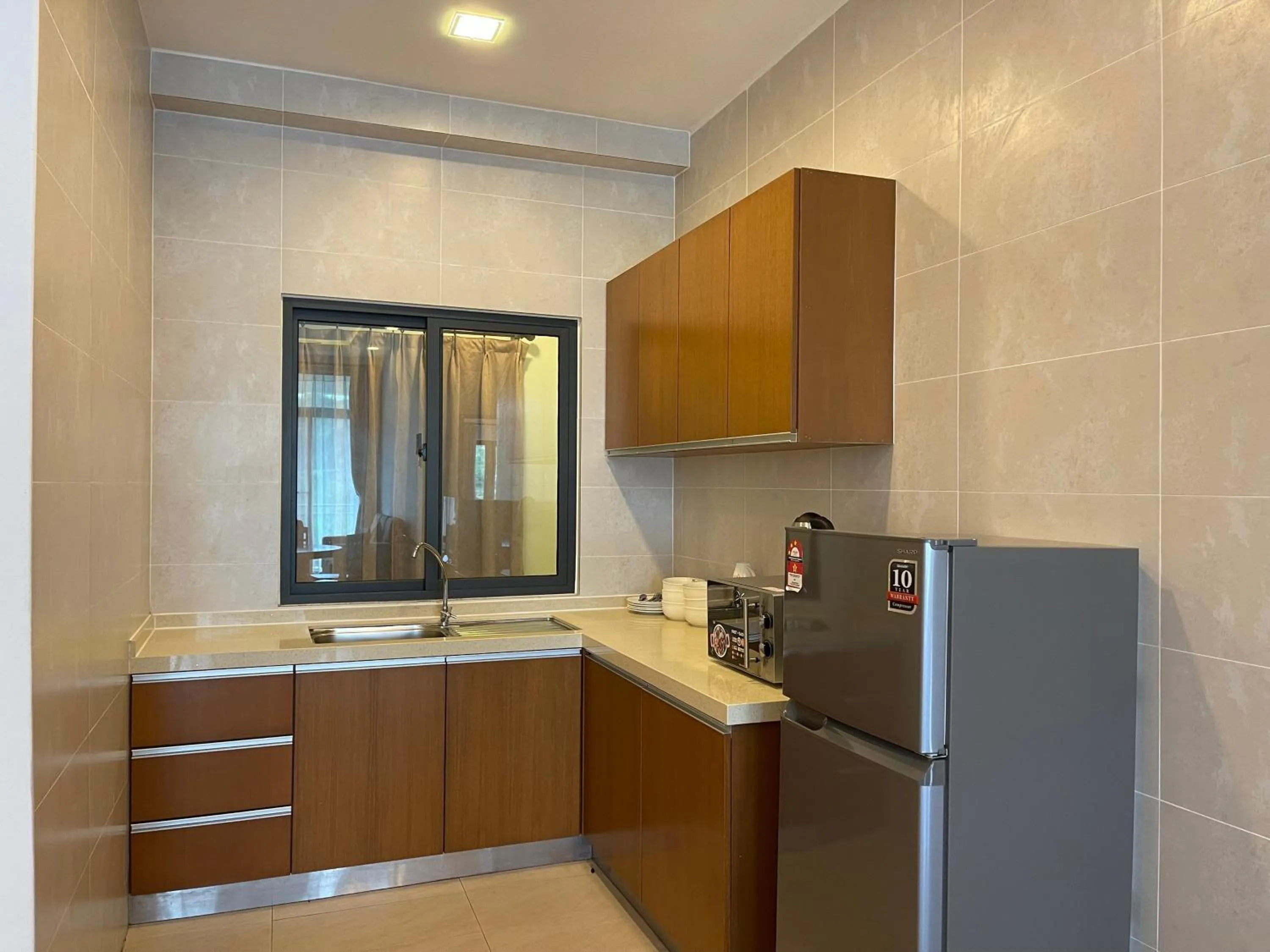 Kitchen or kitchenette in NOVA Apartment at Cameron