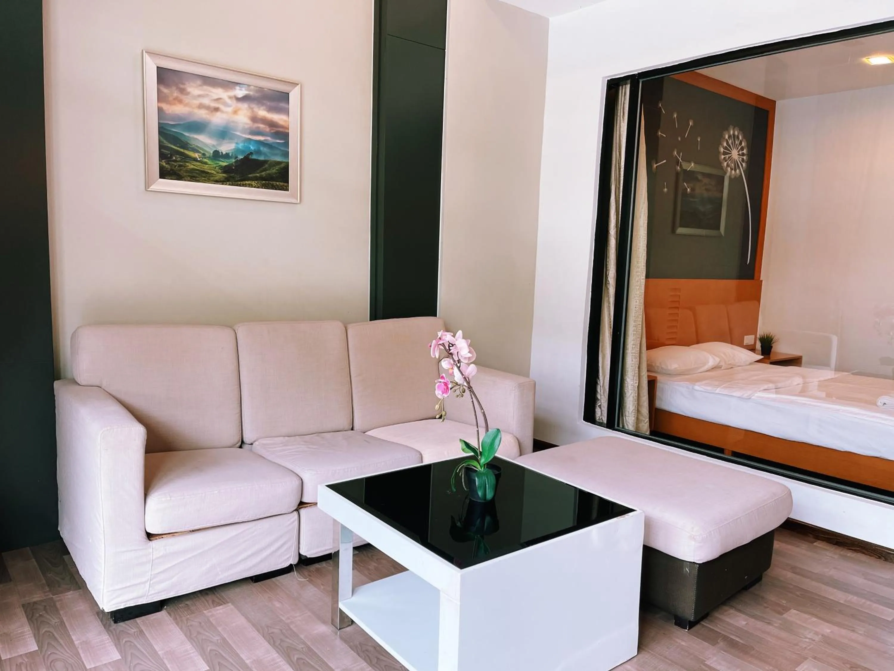 Seating area, Bed in NOVA Apartment at Cameron