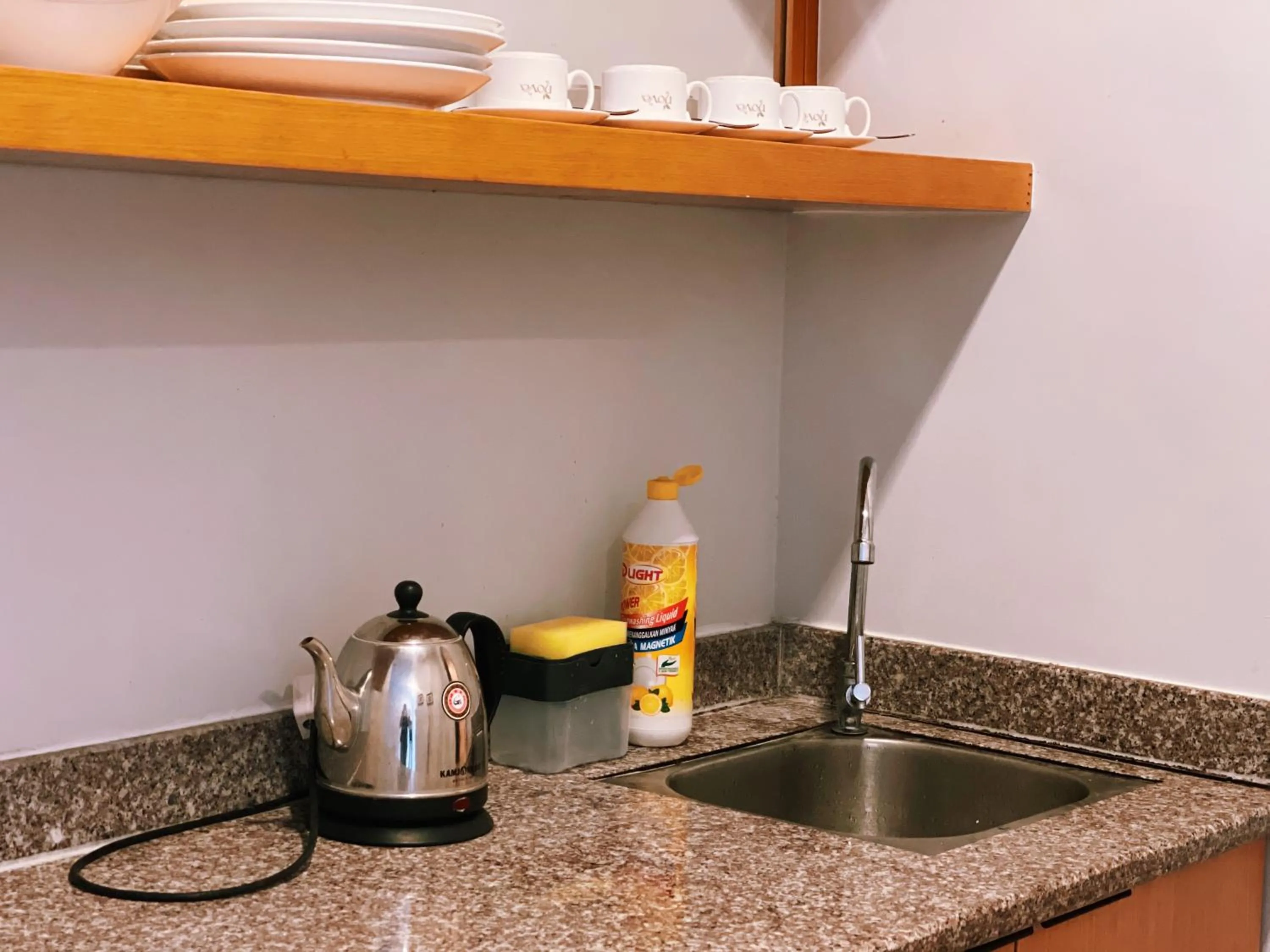 Kitchen or kitchenette in NOVA Apartment at Cameron