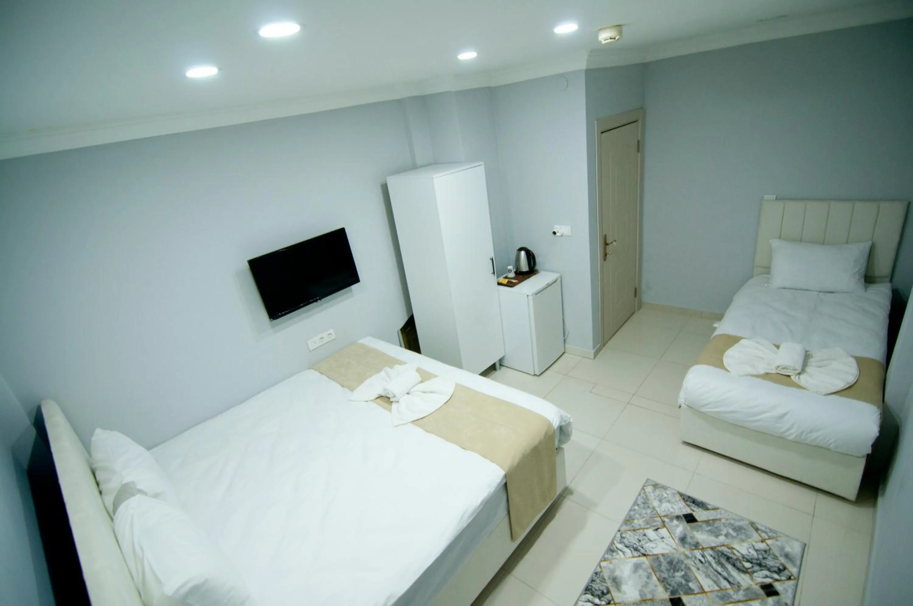 Bed in İstanbul Palace Hotel