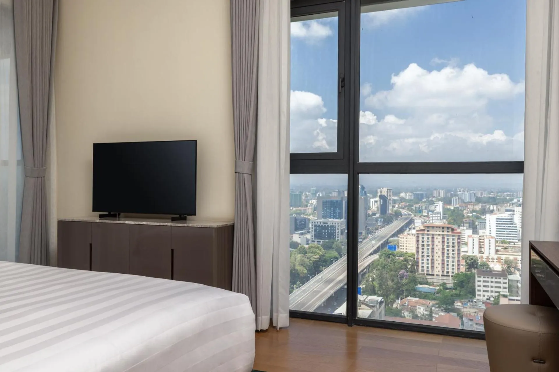 TV and multimedia, Bed in Pan Pacific Serviced Suites Nairobi