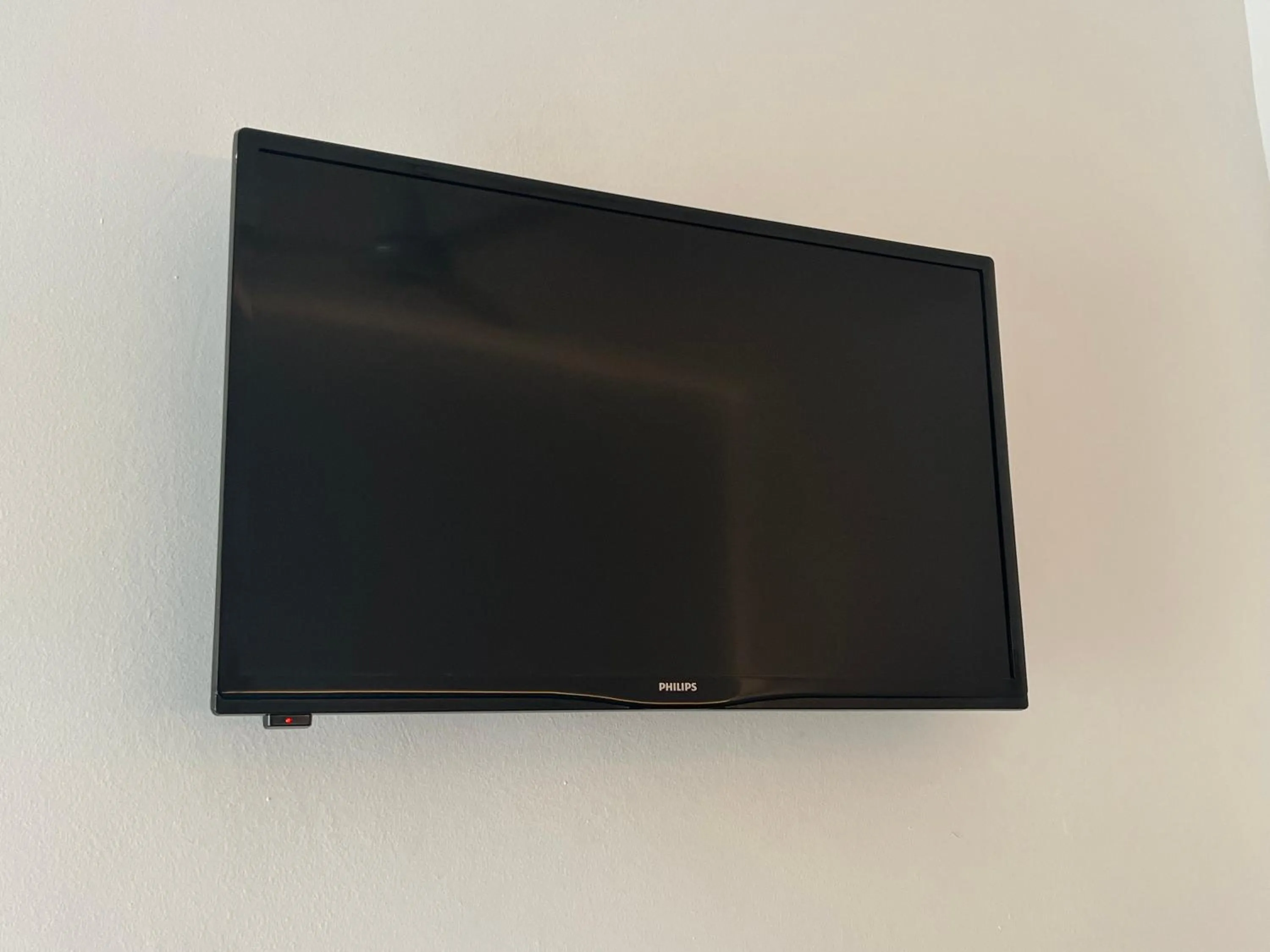 TV and multimedia in Hostal ROM Familiar