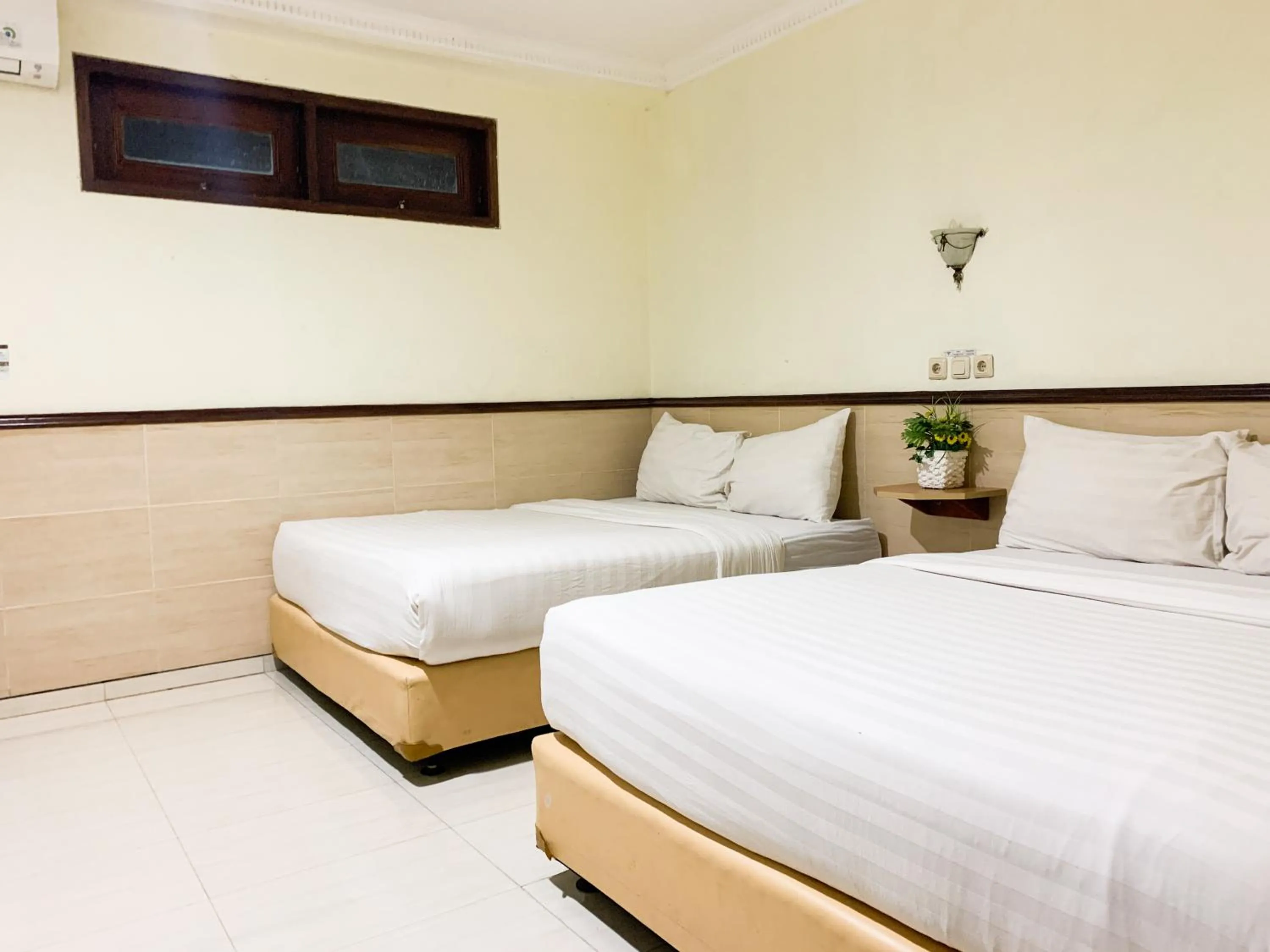 Bedroom in Musafira Hotel Syariah Malioboro Yogyakarta Mitra RedDoorz