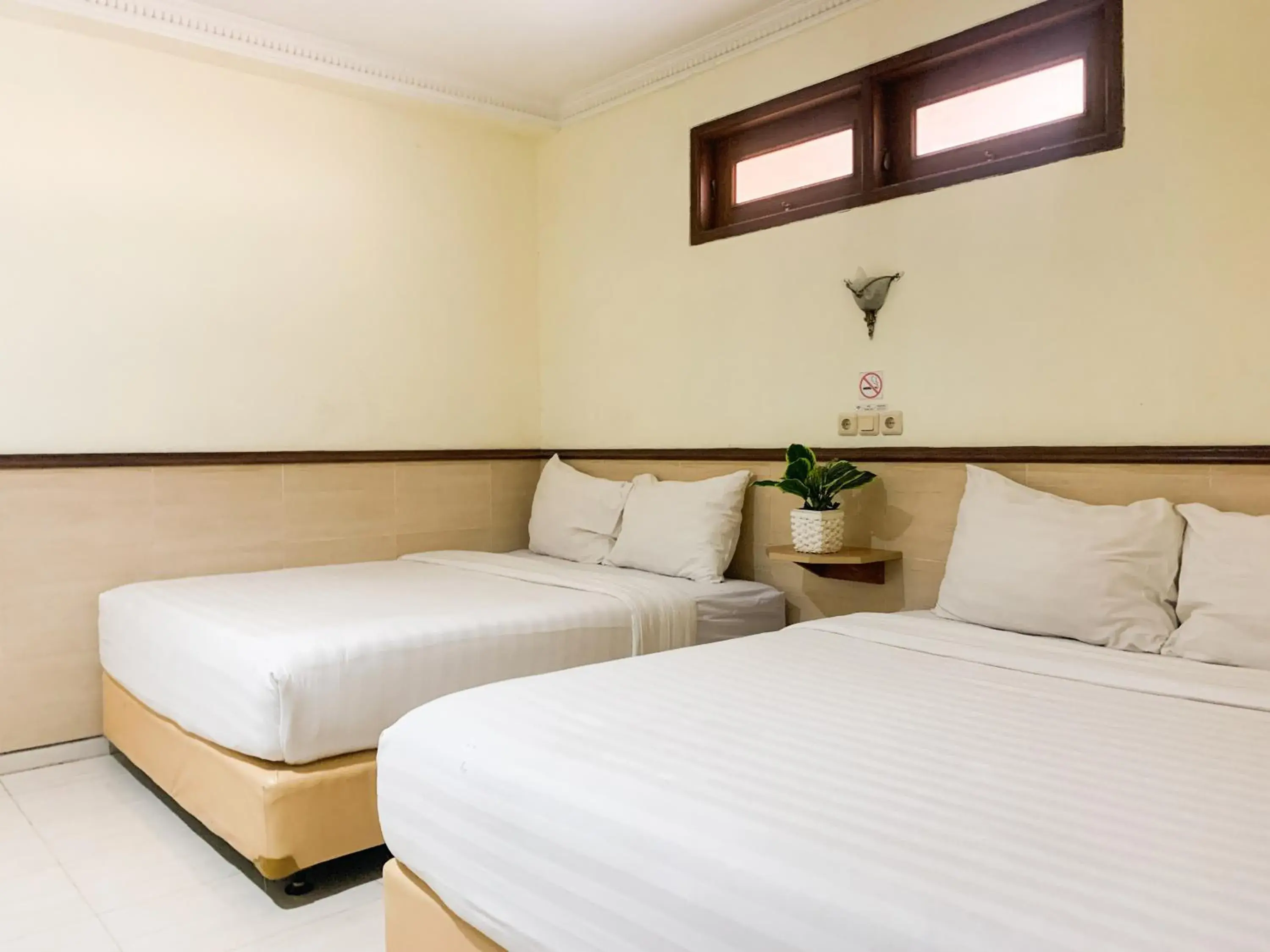 Bedroom, Bed in Musafira Hotel Syariah Malioboro Yogyakarta RedPartner