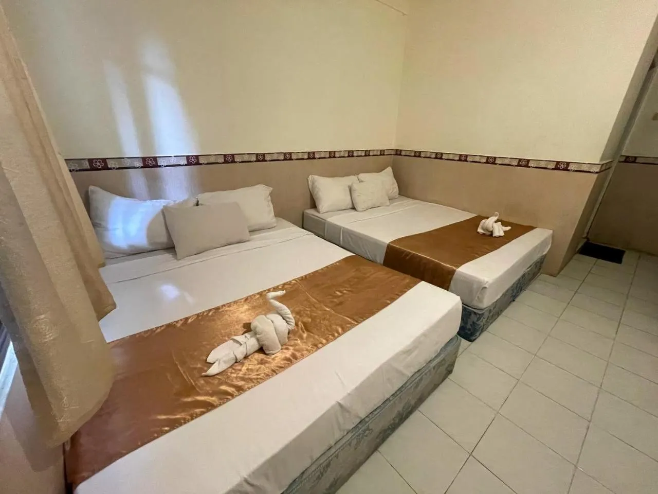 Bedroom in Musafira Hotel Syariah Malioboro Yogyakarta Mitra RedDoorz