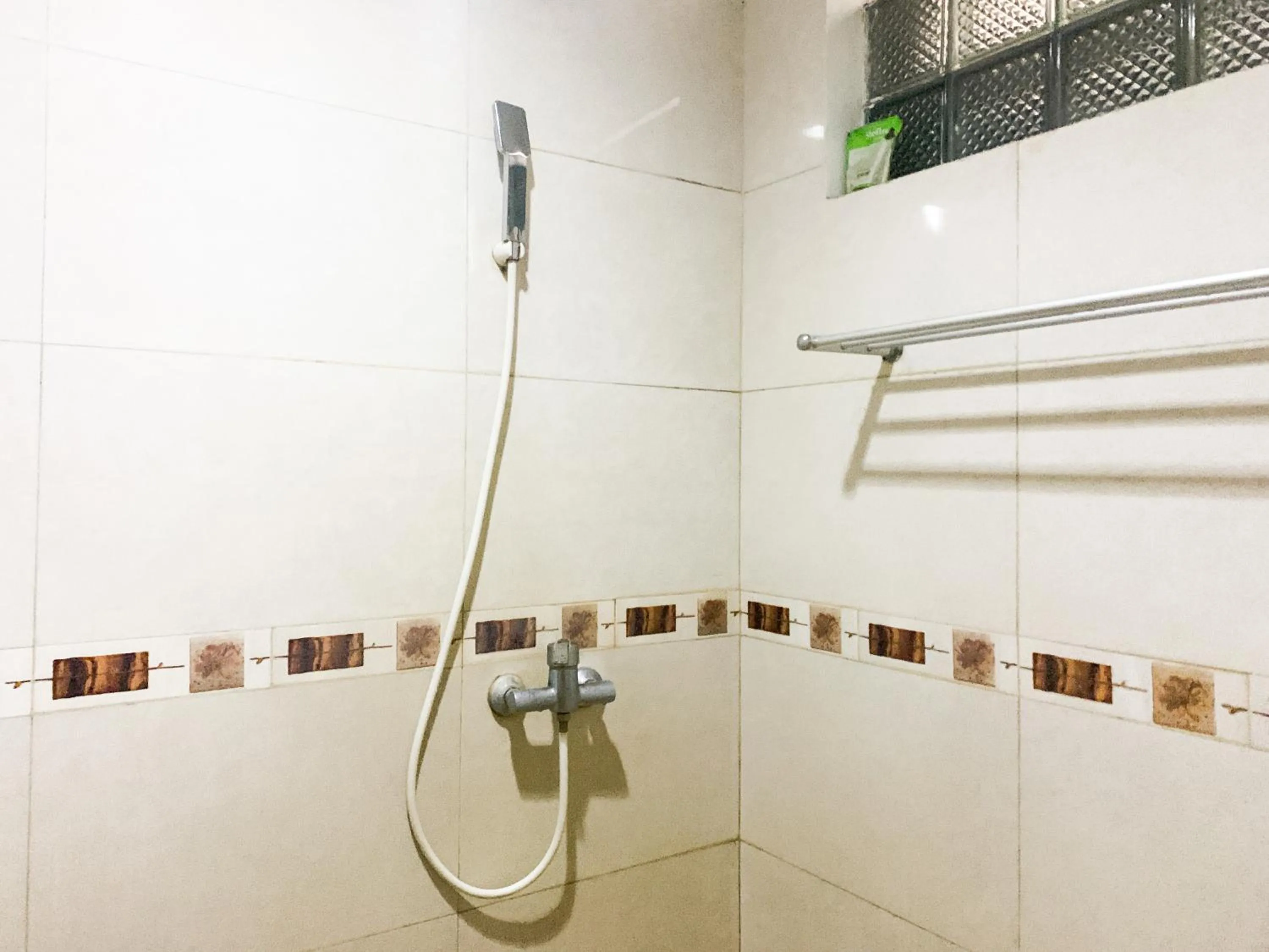 Shower, Bathroom in Musafira Hotel Syariah Malioboro Yogyakarta Mitra RedDoorz
