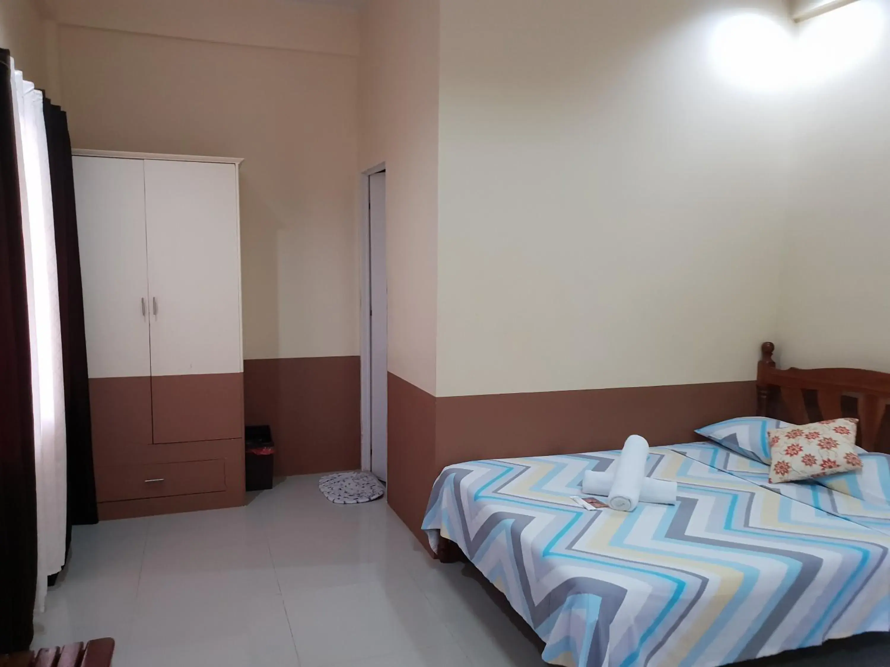 Bed in DIAKOPES INN Bed in DIAKOPES INN