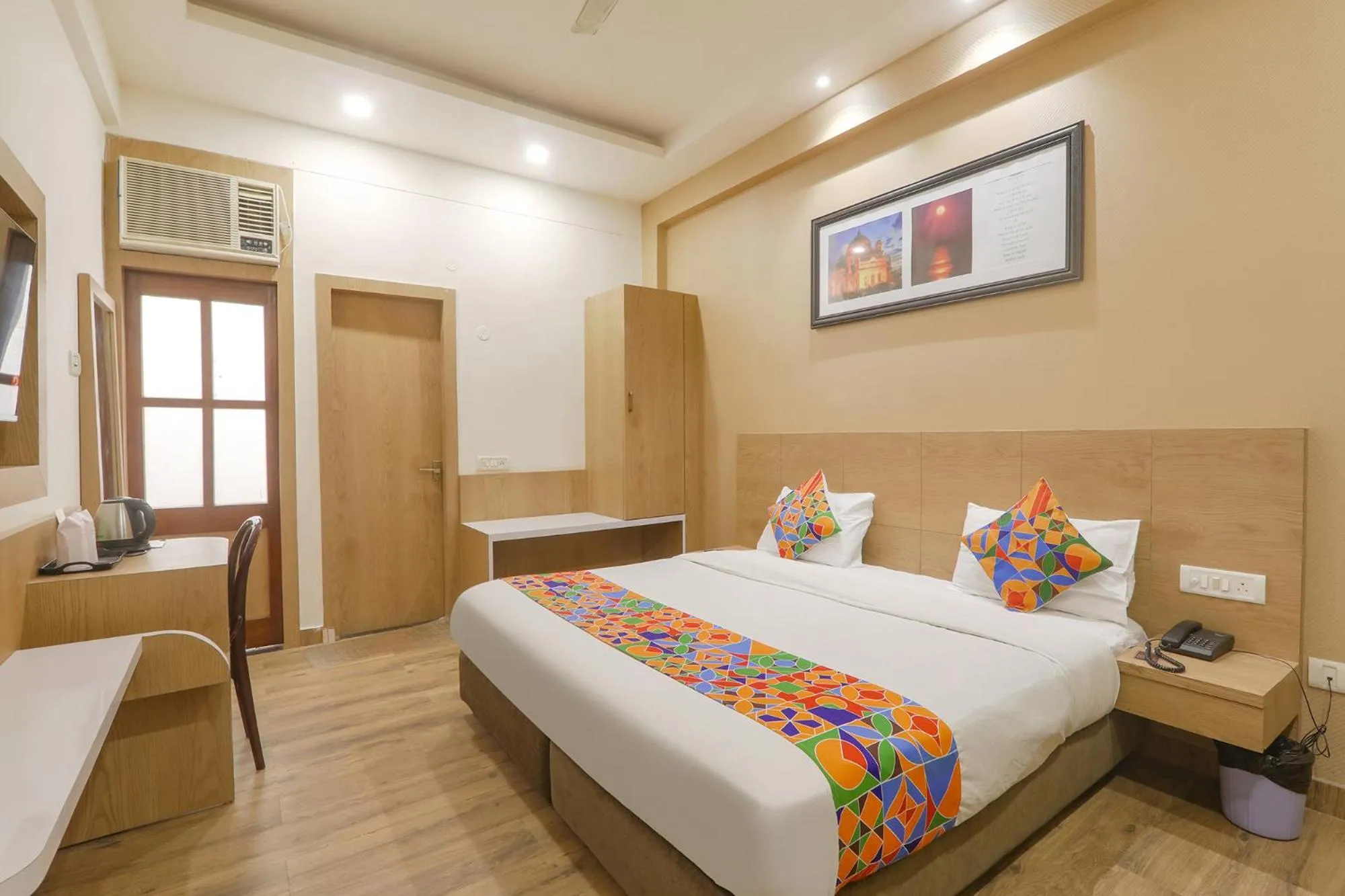 Bed in FabHotel Raghubar Kripa