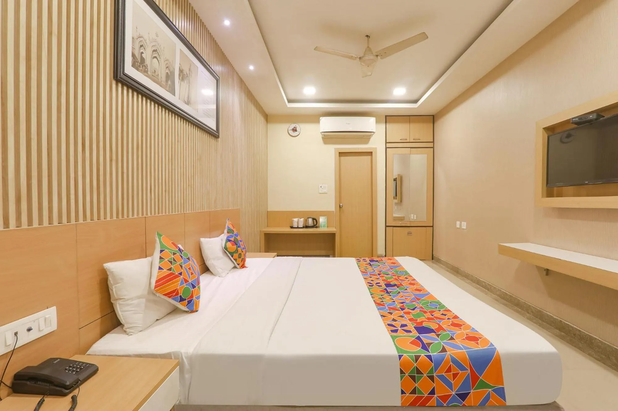 Bed in FabHotel Raghubar Kripa